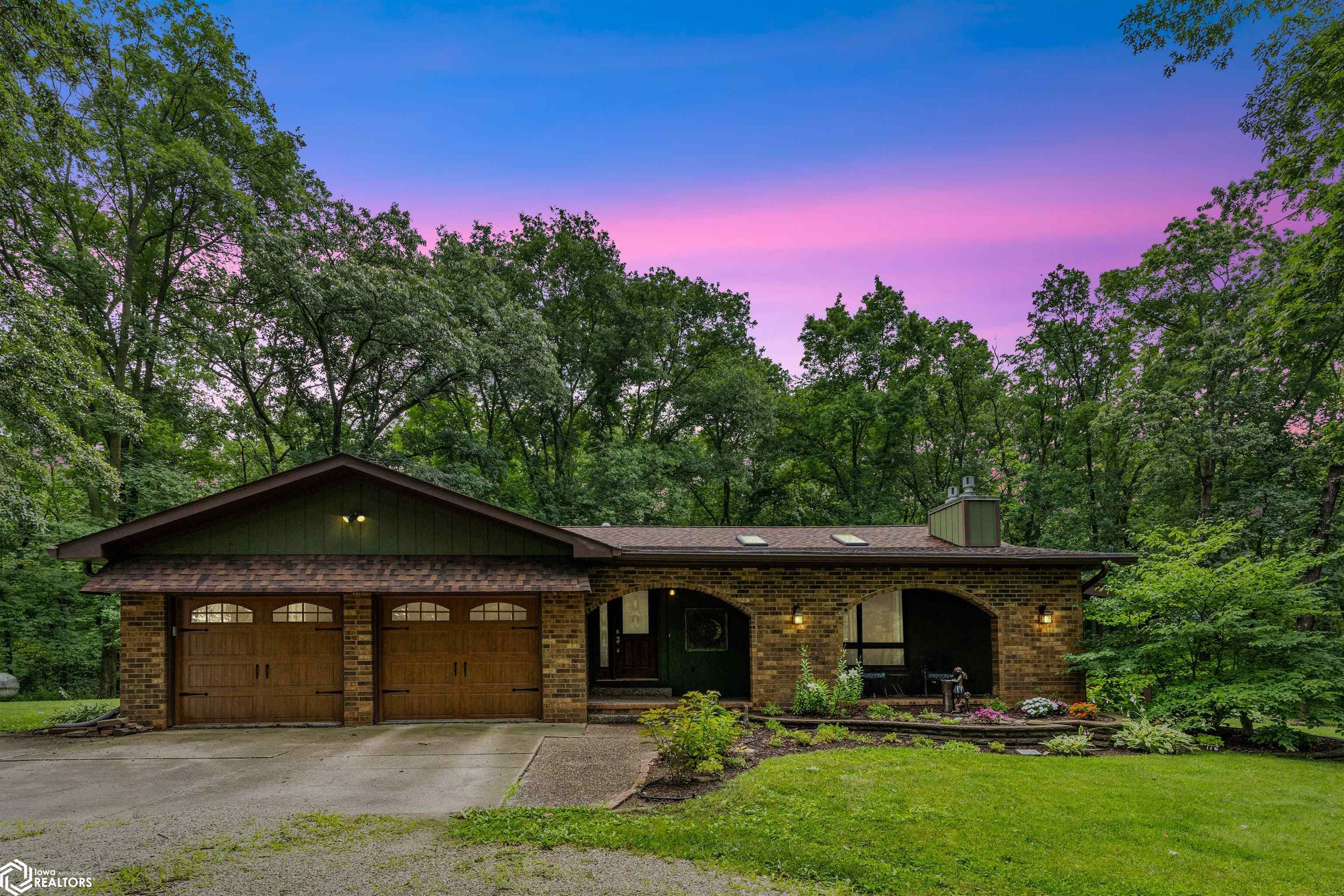 Property Photo:  5718 Hunt Road  IA 52601 