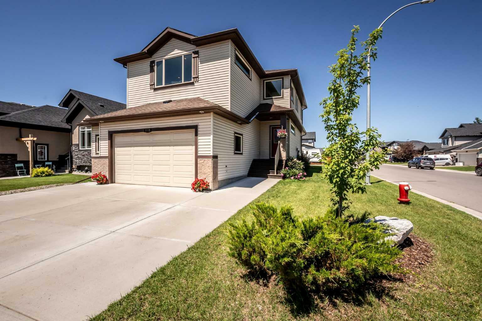 Property Photo: 2103 High Country Rise NW AB T1V 0E1