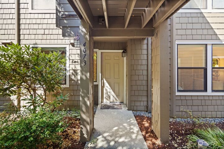 Property Photo:  4073 220th Place SE 1040  WA 98029 