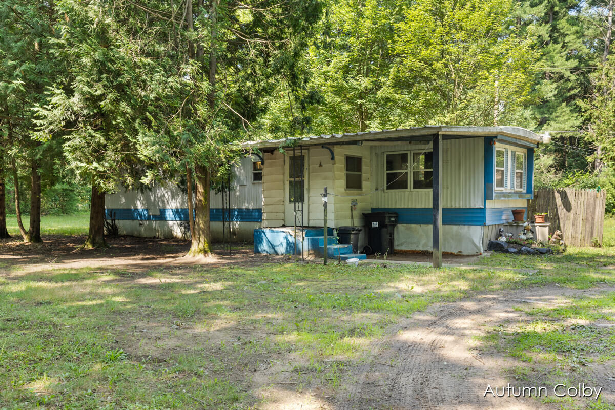Property Photo:  11981 Podunk Avenue NE  MI 48838 
