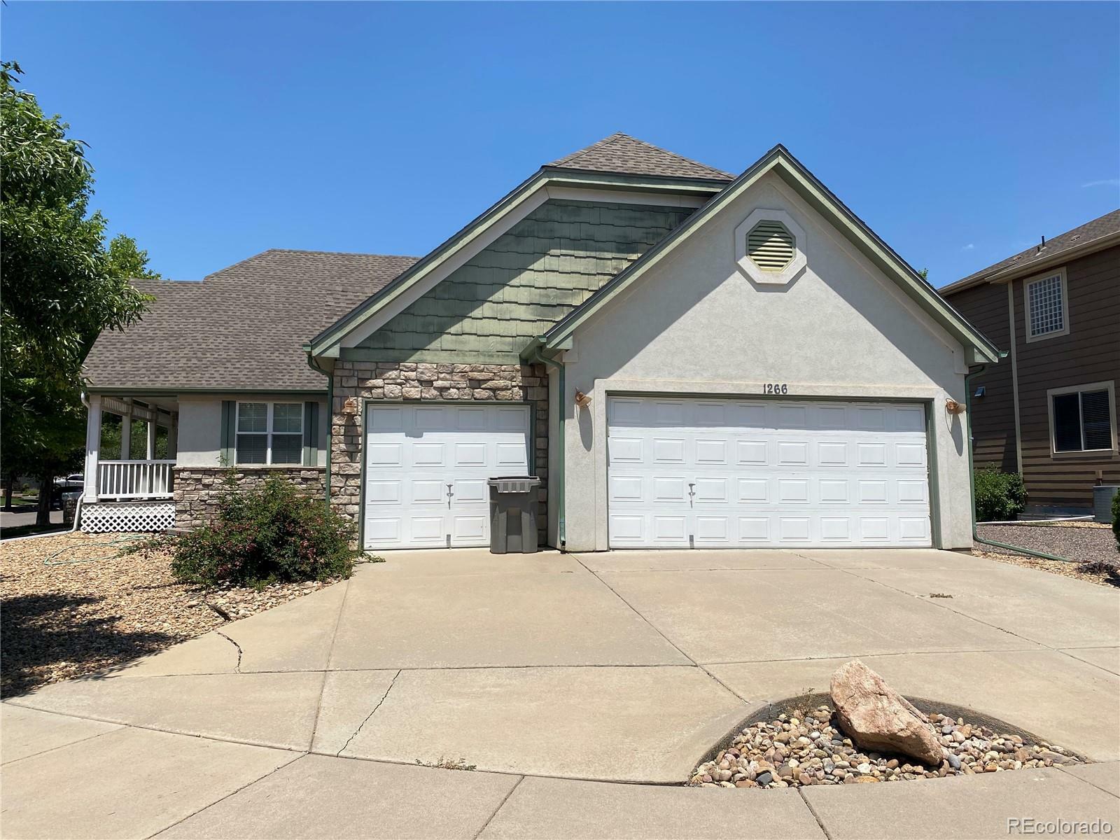 Property Photo: 1266 S Ammons Street CO 80232