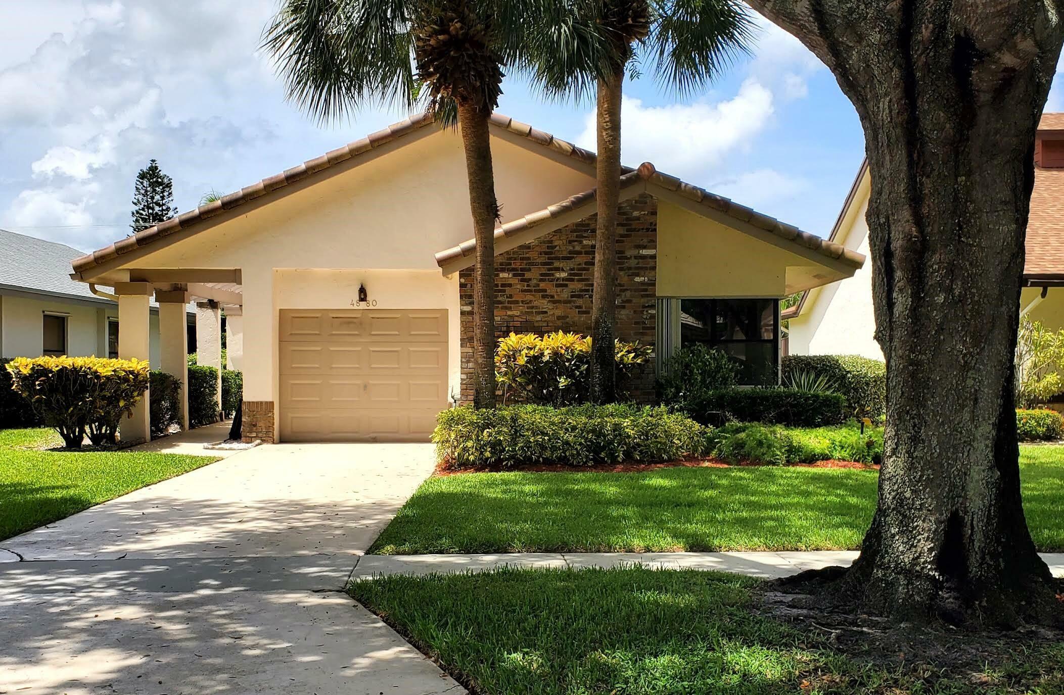 Property Photo:  4880 Boxwood Circle  FL 33436 