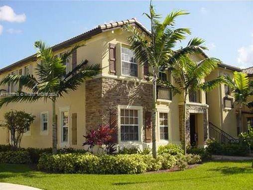 Property Photo:  3350 NE 13th Cir Dr 104-21  FL 33033 