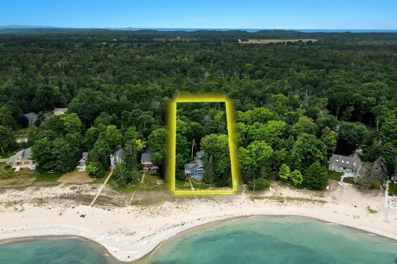 Property Photo:  13848 N Forest Beach  MI 49670 