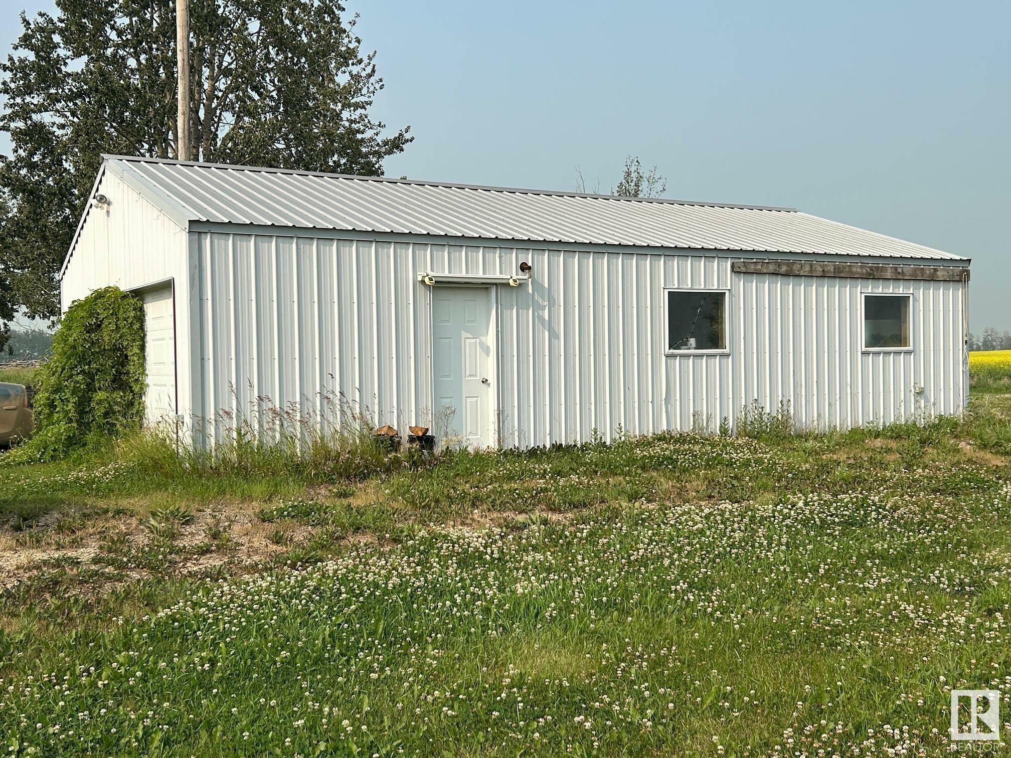 Property Photo:  59307 Hwy 63  AB T0A 3J0 