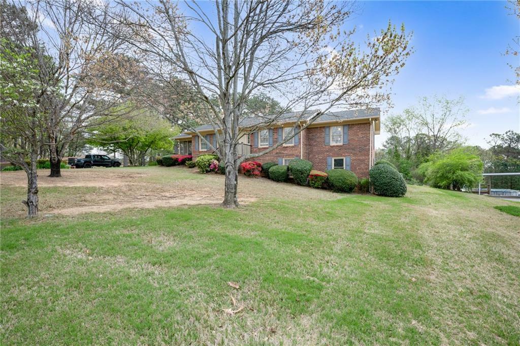 Property Photo:  208 Woodland Circle SE  GA 30701 