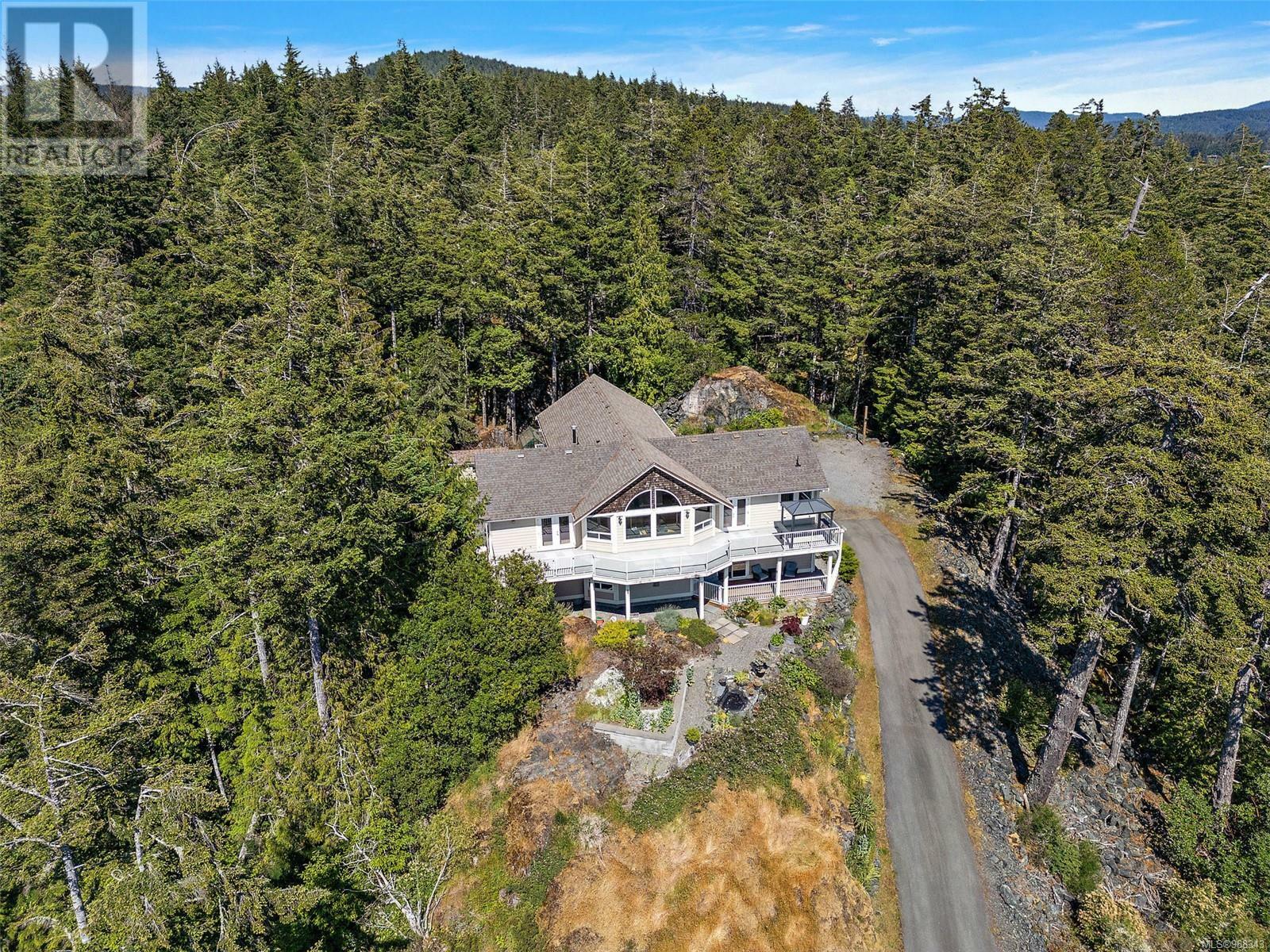 Photo de la propriété:  7824 Dalrae Place  BC V9Z 0R1 