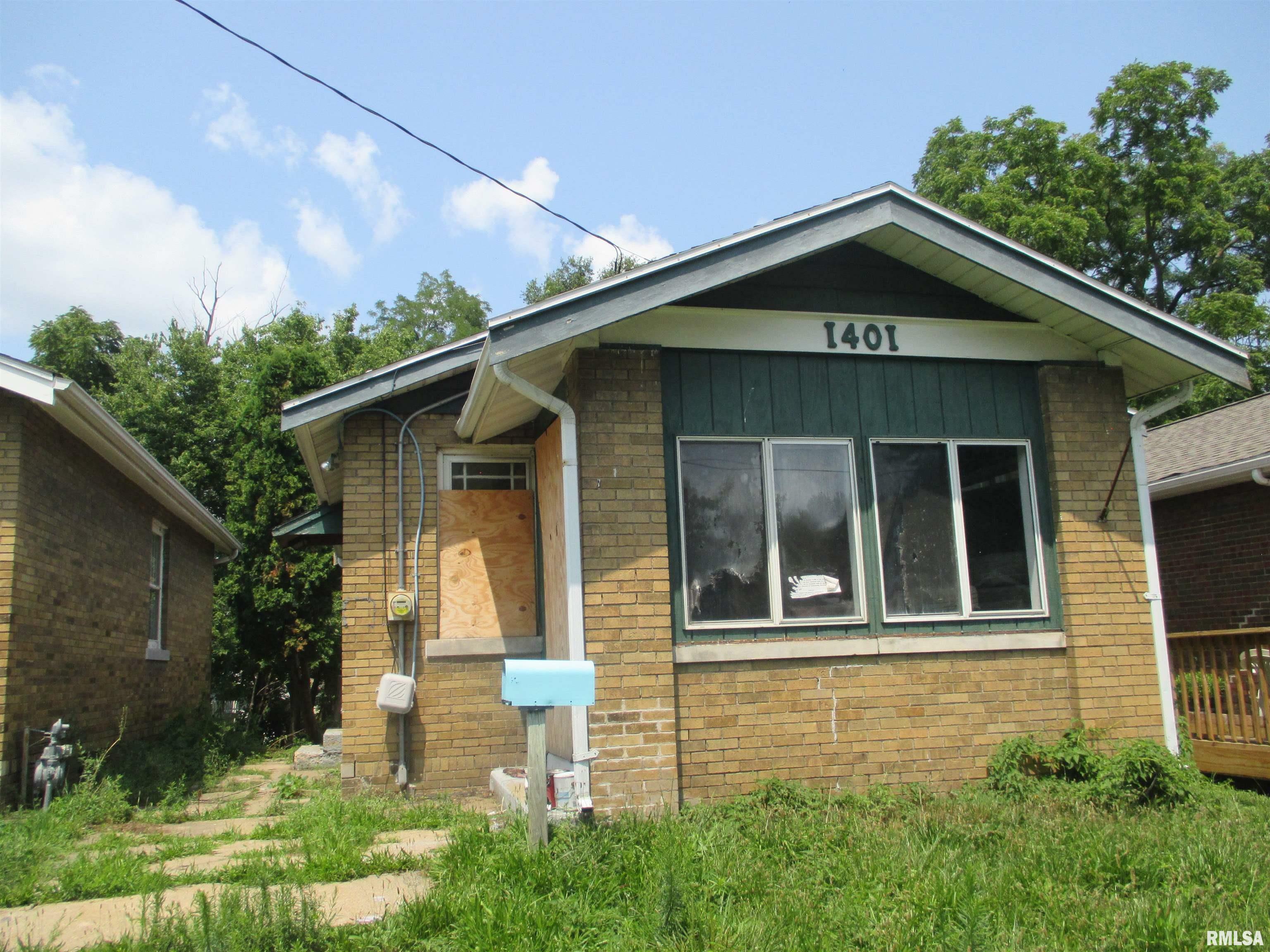 Property Photo:  1401 E Rouse Avenue  IL 61614 