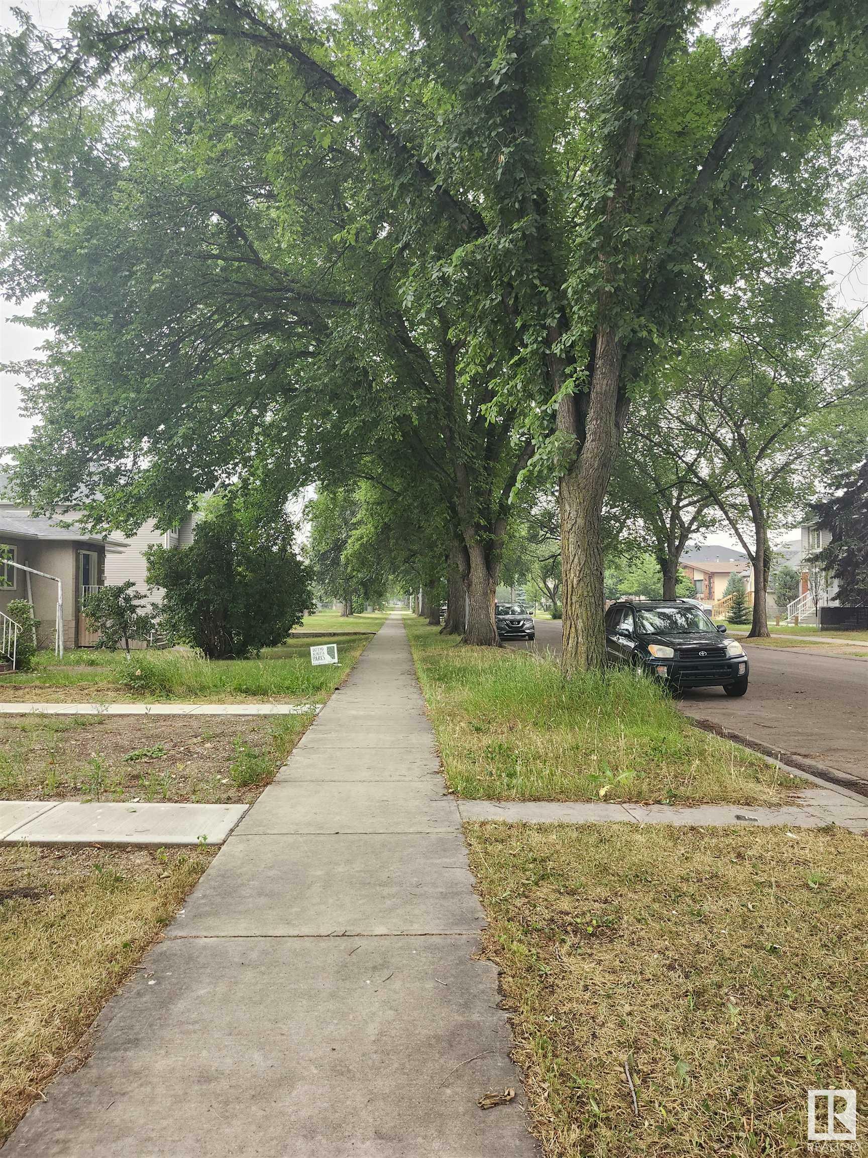 Property Photo:  12239 101 Street NW  AB T5G 2C5 