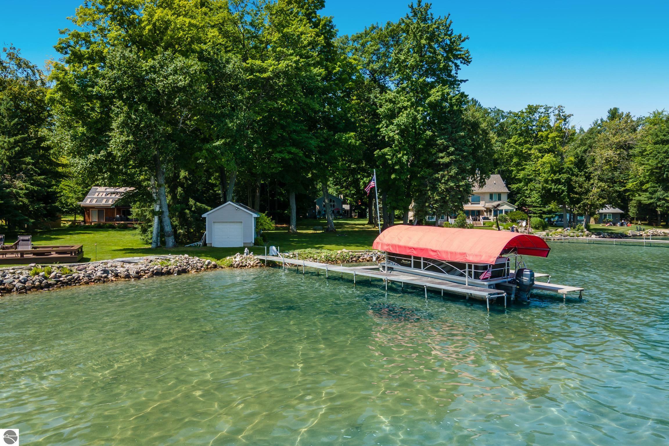 Property Photo:  8666 Skegemog Point Road  MI 49690 