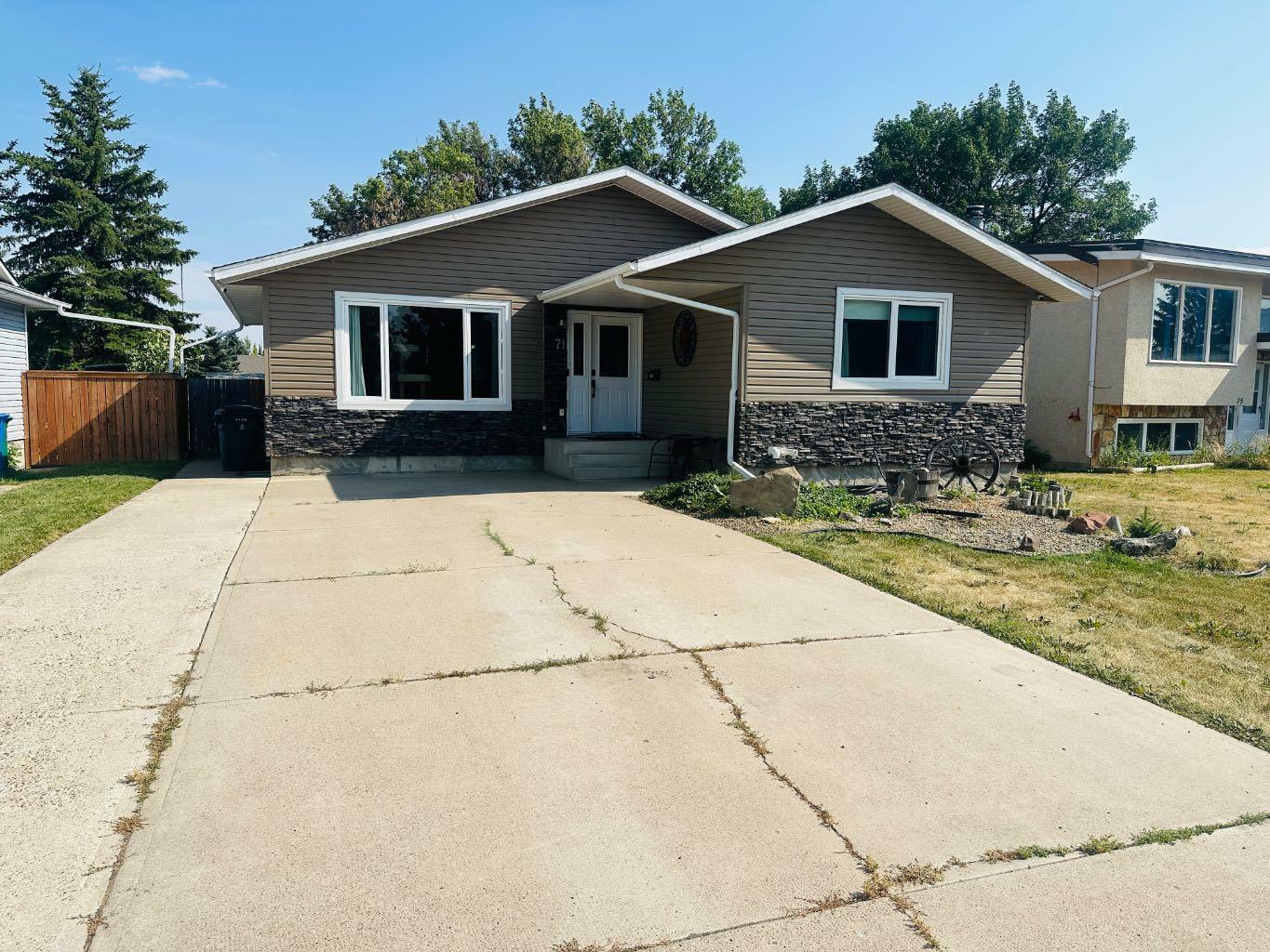 Property Photo: 71 Ryerson Road W AB T1K 4N7