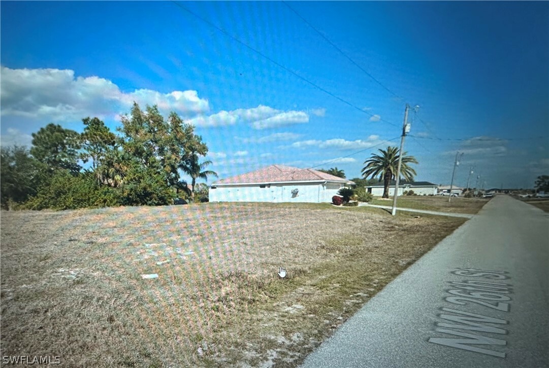 Property Photo:  1723 NW 26th Street  FL 33993 