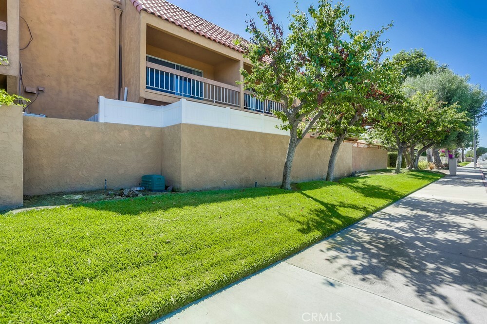 Property Photo:  6600 Warner Avenue 28  CA 92647 