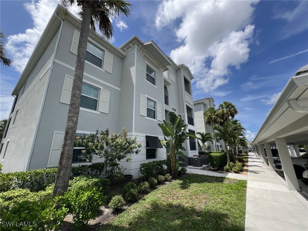 Property Photo:  6058 National Boulevard 311  FL 34142 