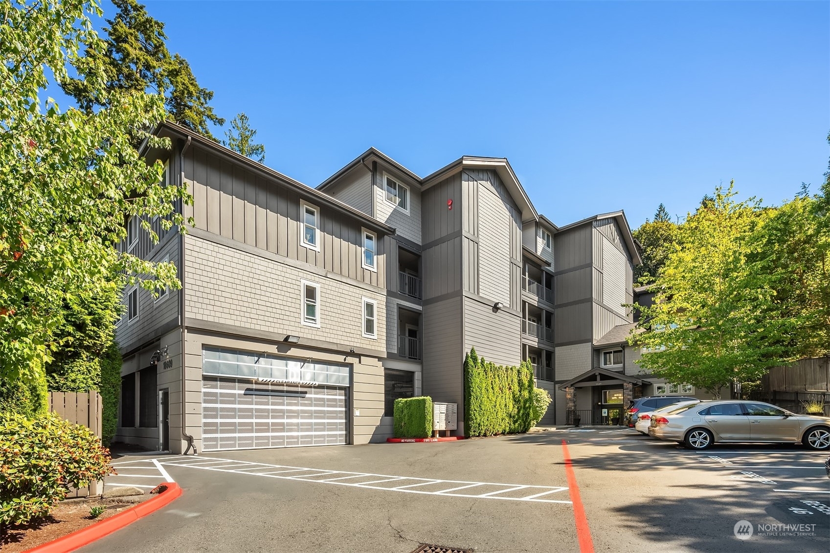 Property Photo:  18609 SE Newport Way 406  WA 98027 