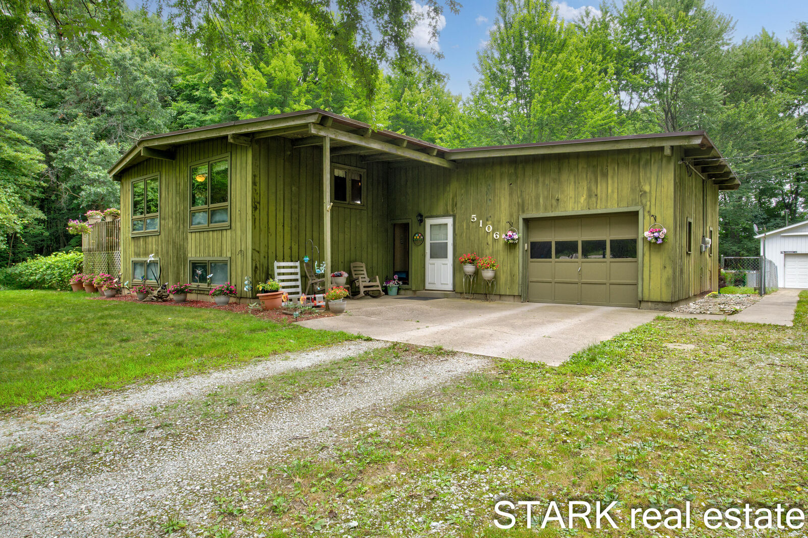 Property Photo:  5106 S Quarterline Road  MI 49444 
