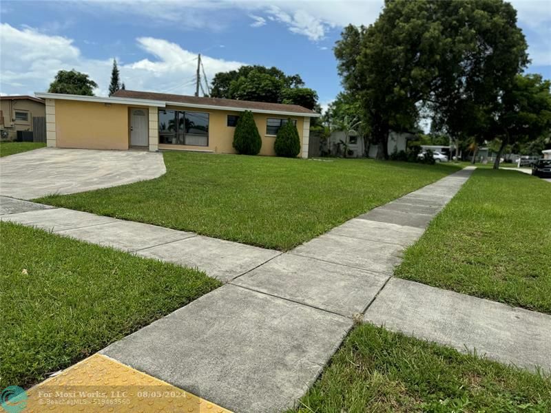 Property Photo:  6101 NW 18th St  FL 33063 