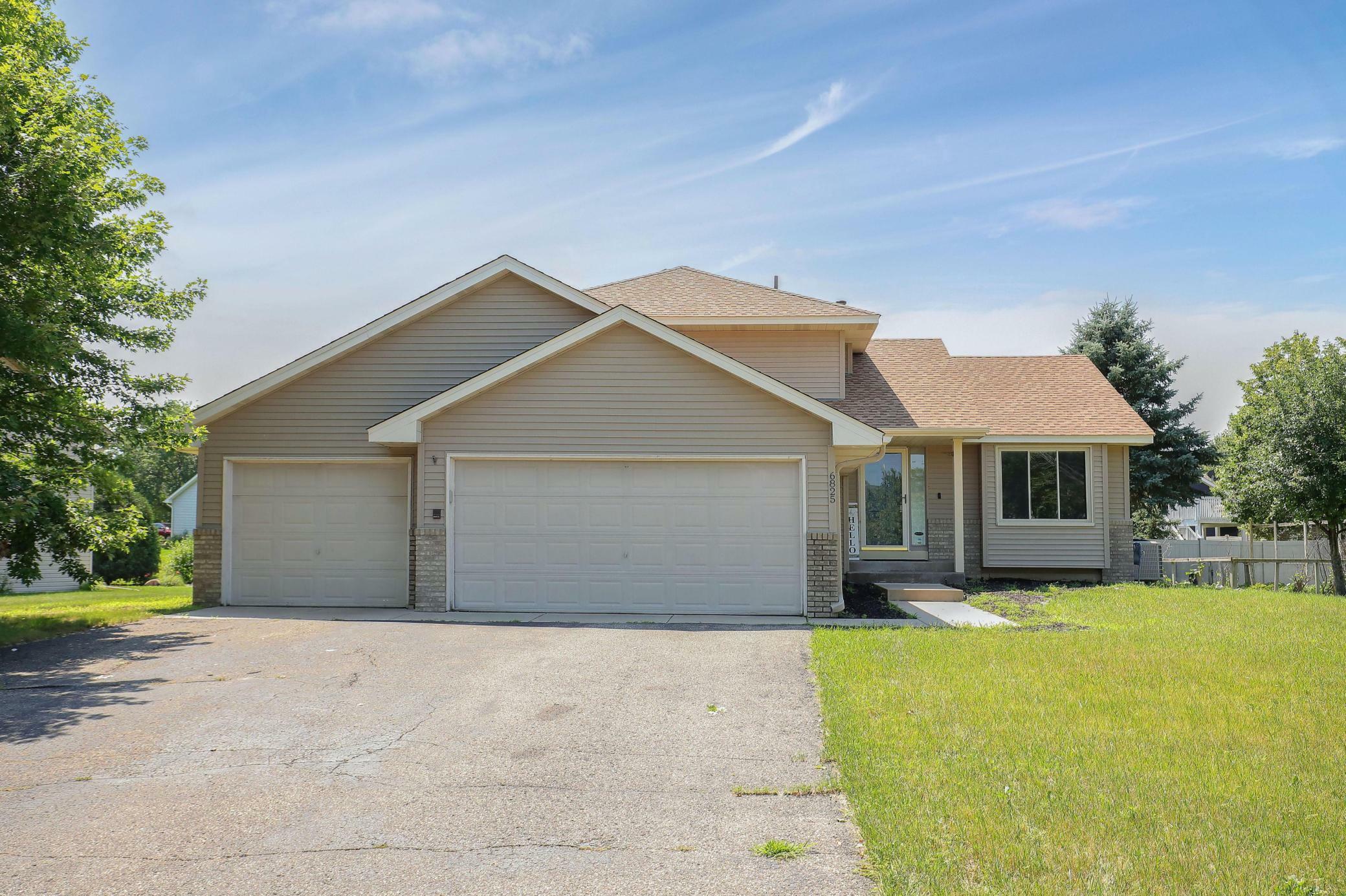 Property Photo:  6825 91st Trail N  MN 55445 