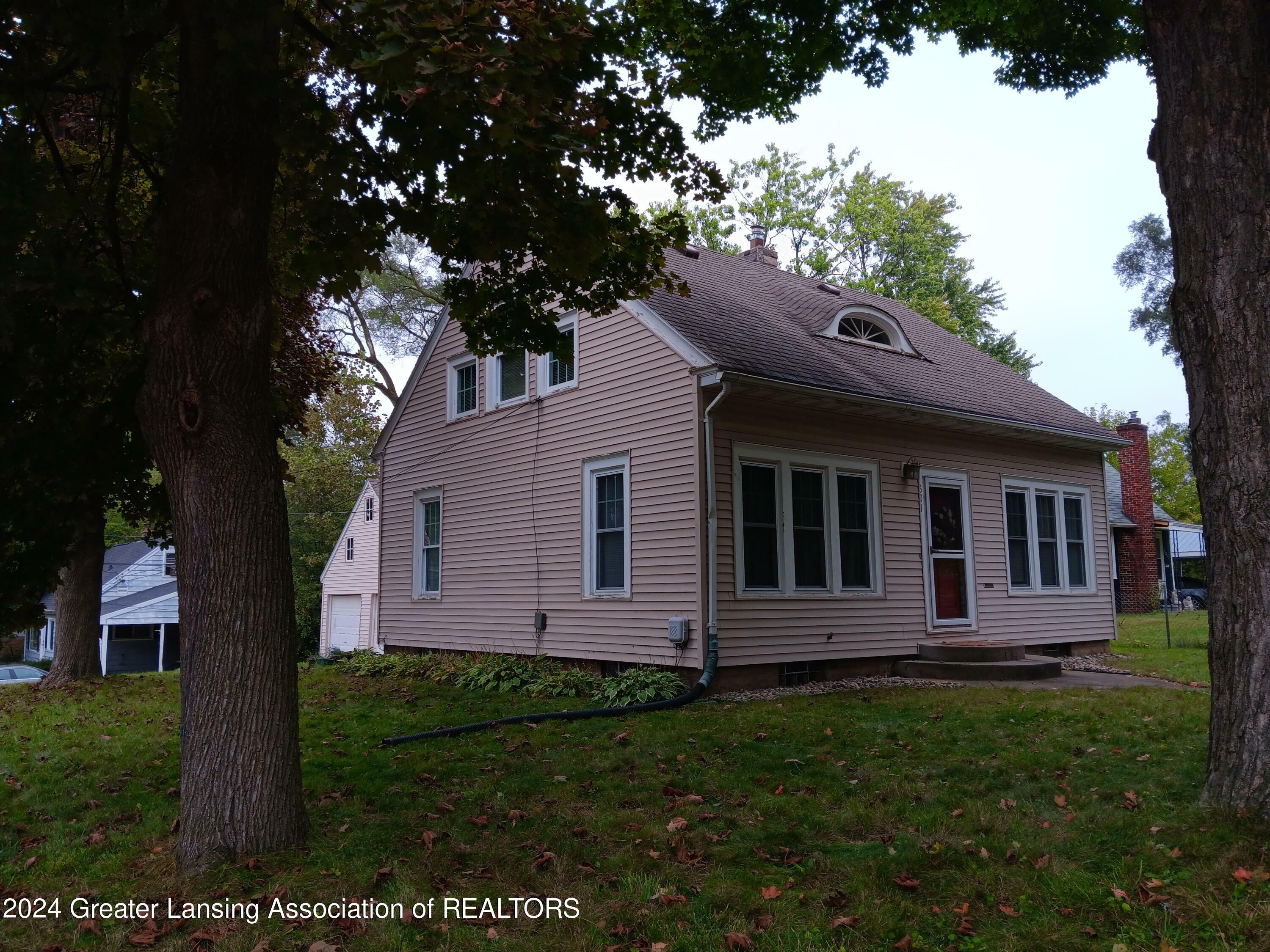 Property Photo:  601 Ridgewood  MI 48910 