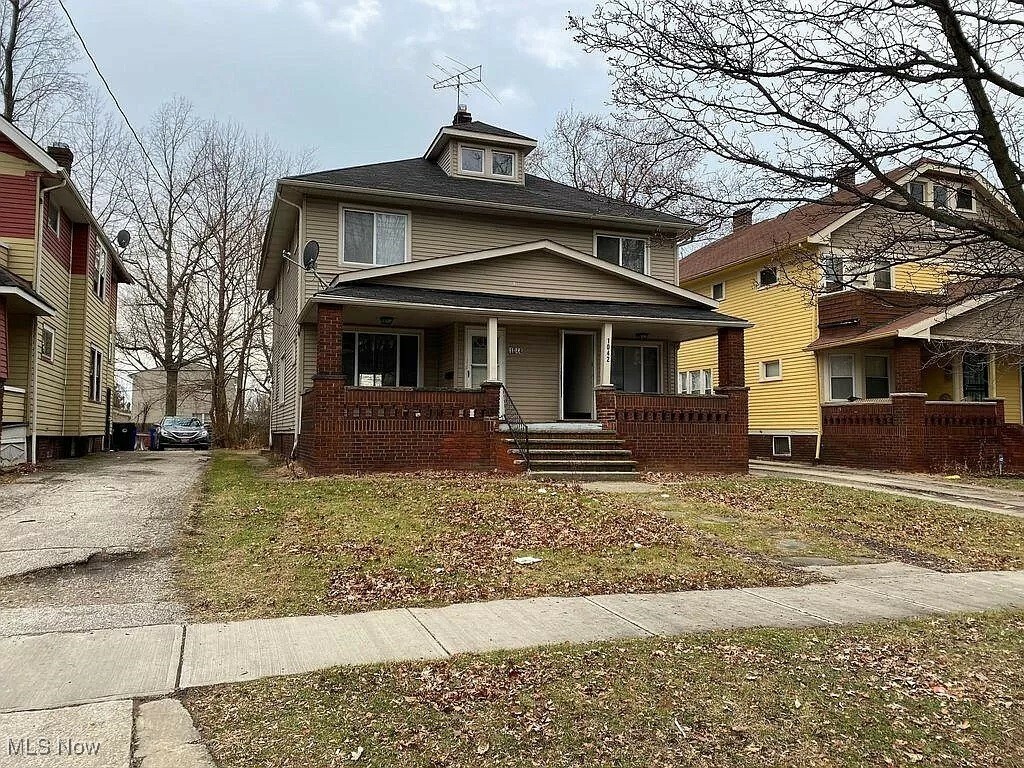 Property Photo:  1044 E 169 Street  OH 44110 