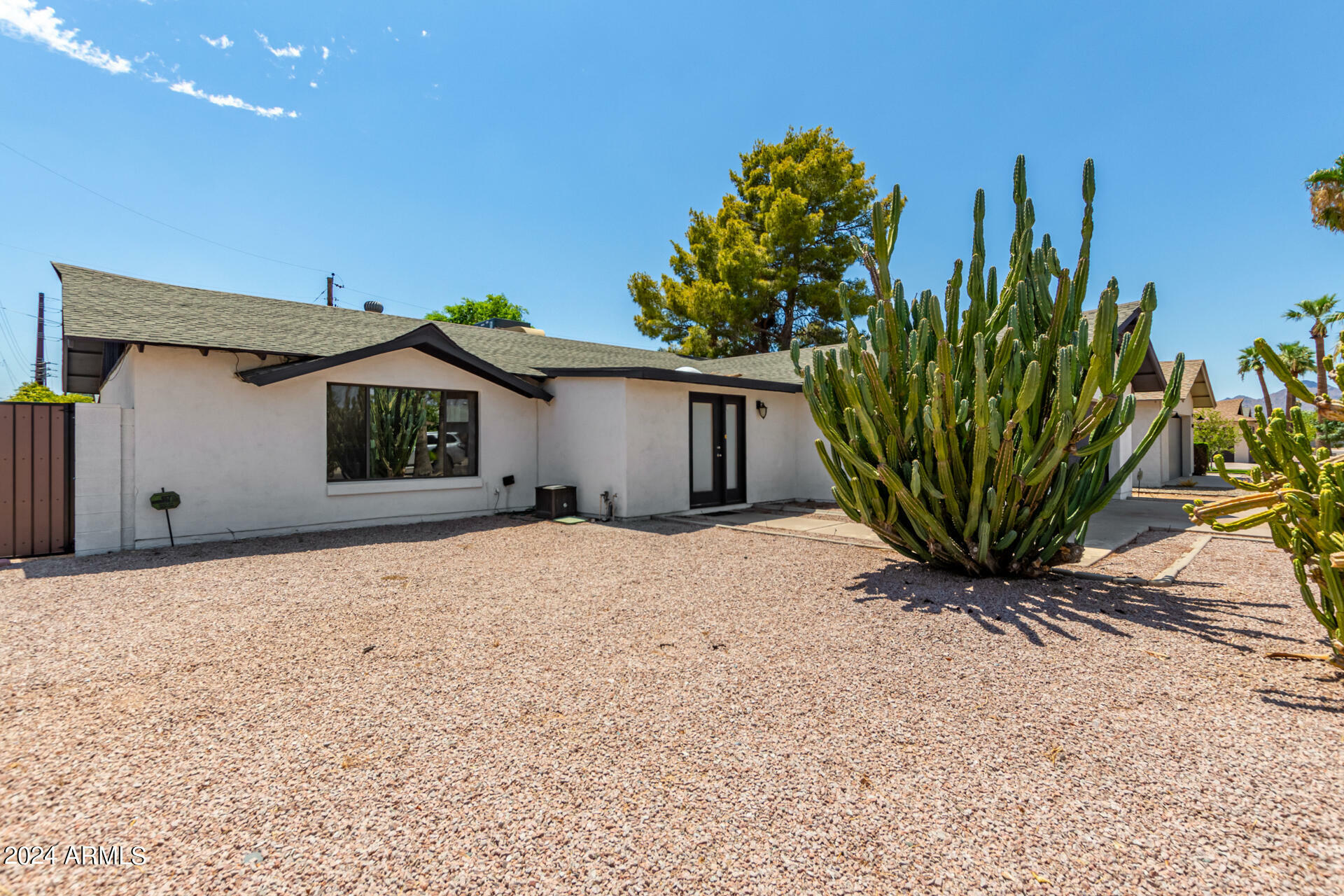 Property Photo:  8755 E Plaza Avenue  AZ 85250 