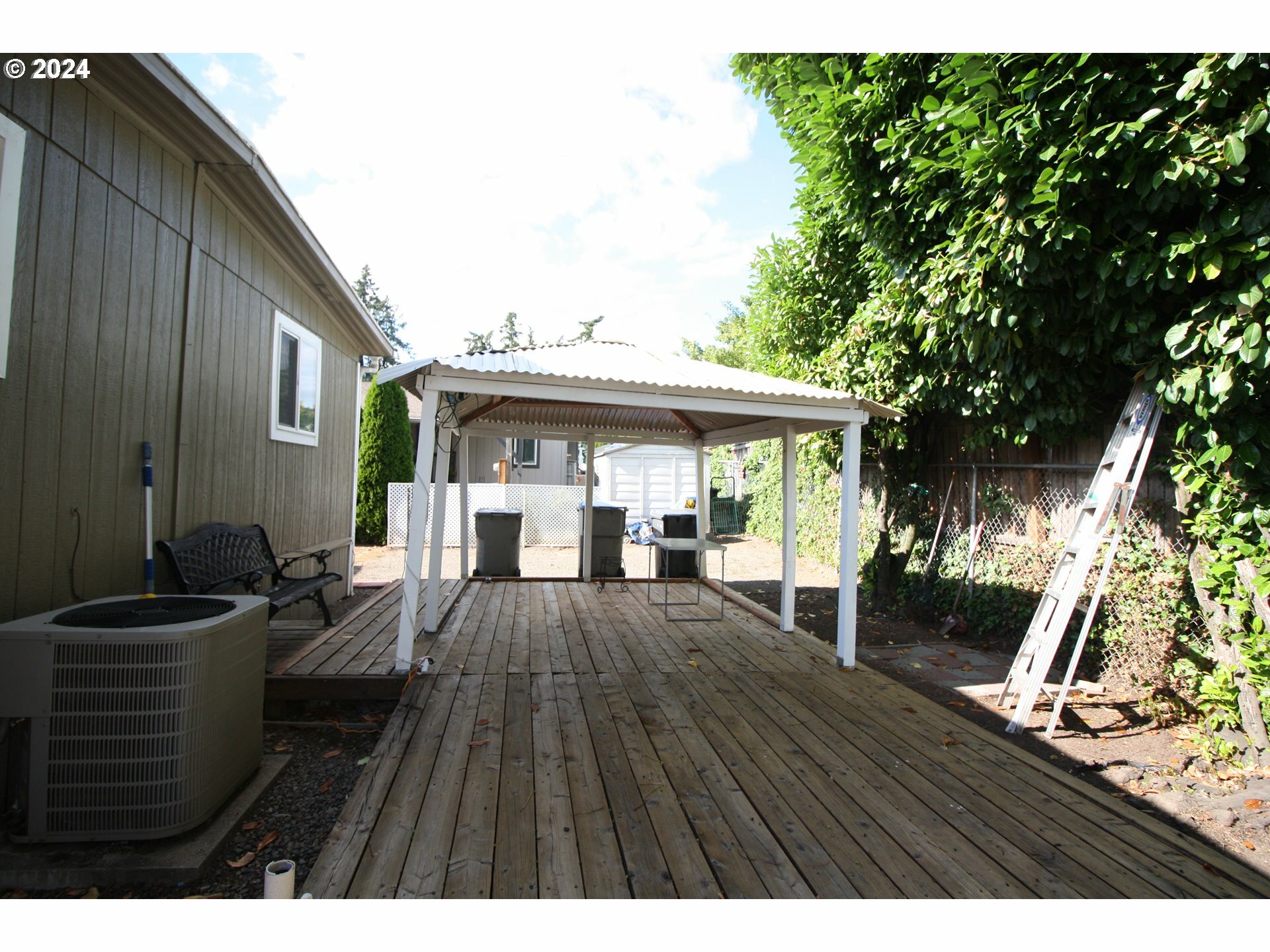 Property Photo:  12450 SW Fischer Rd 143  OR 97224 