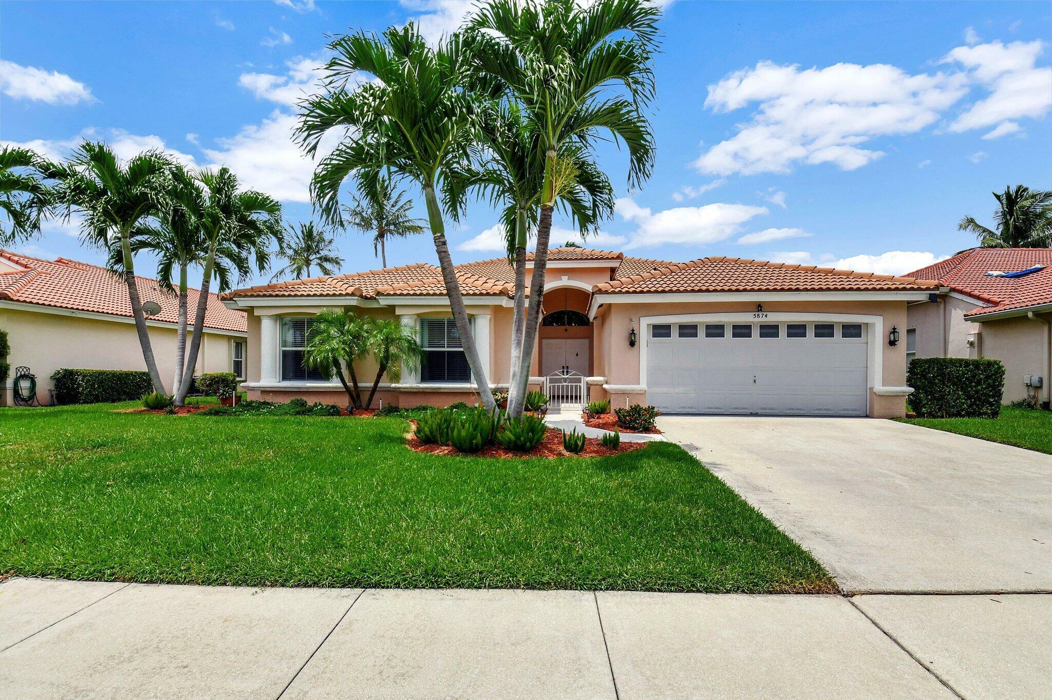 Property Photo:  5874 Las Colinas Circle  FL 33463 