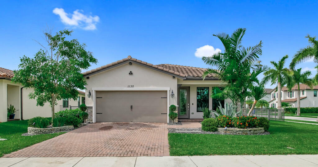 Property Photo:  1130 Whitcombe Drive  FL 33411 