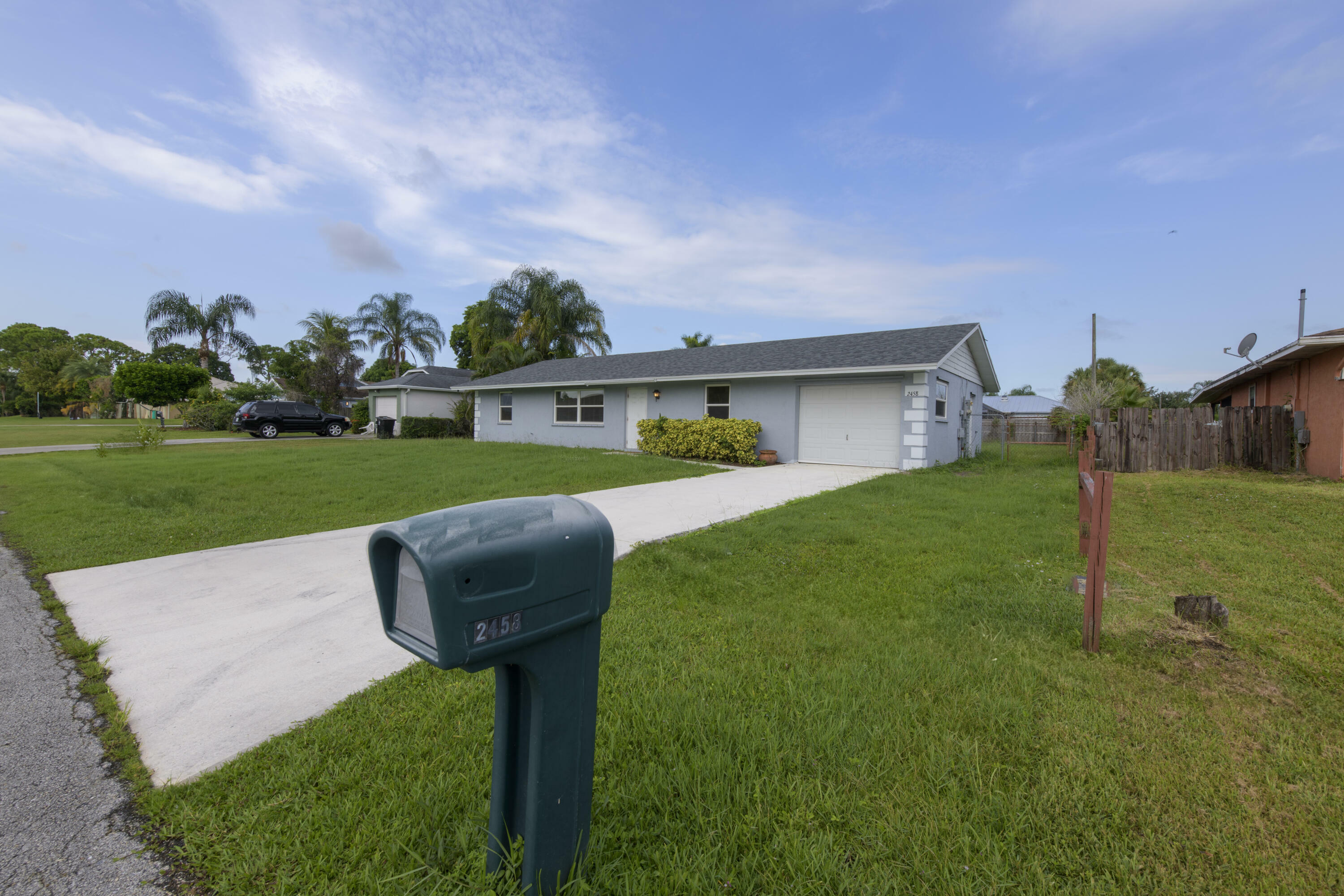 Property Photo:  2458 SW Hinchman Street  FL 34984 