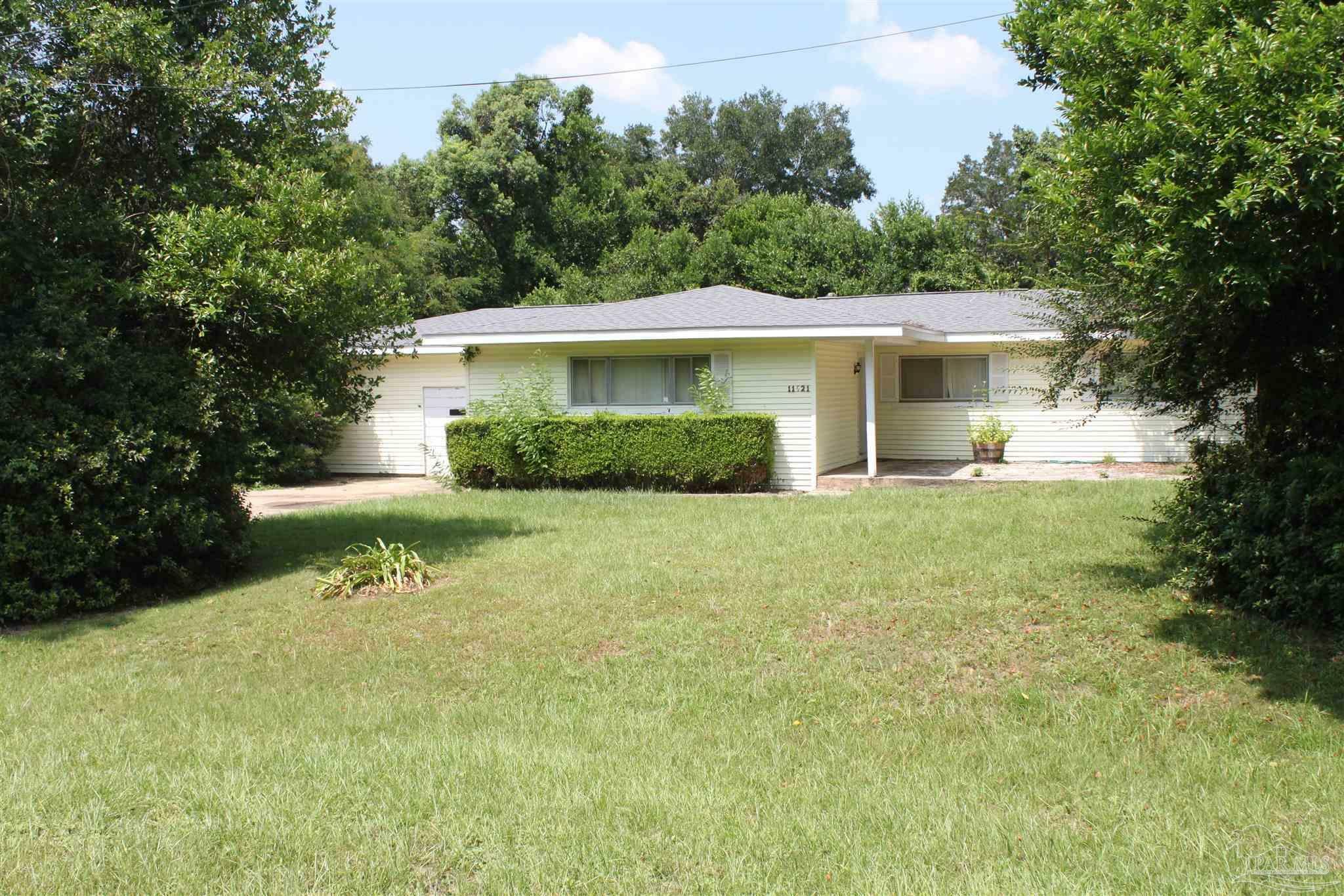 Property Photo:  11521 Chemstrand Rd  FL 32534 