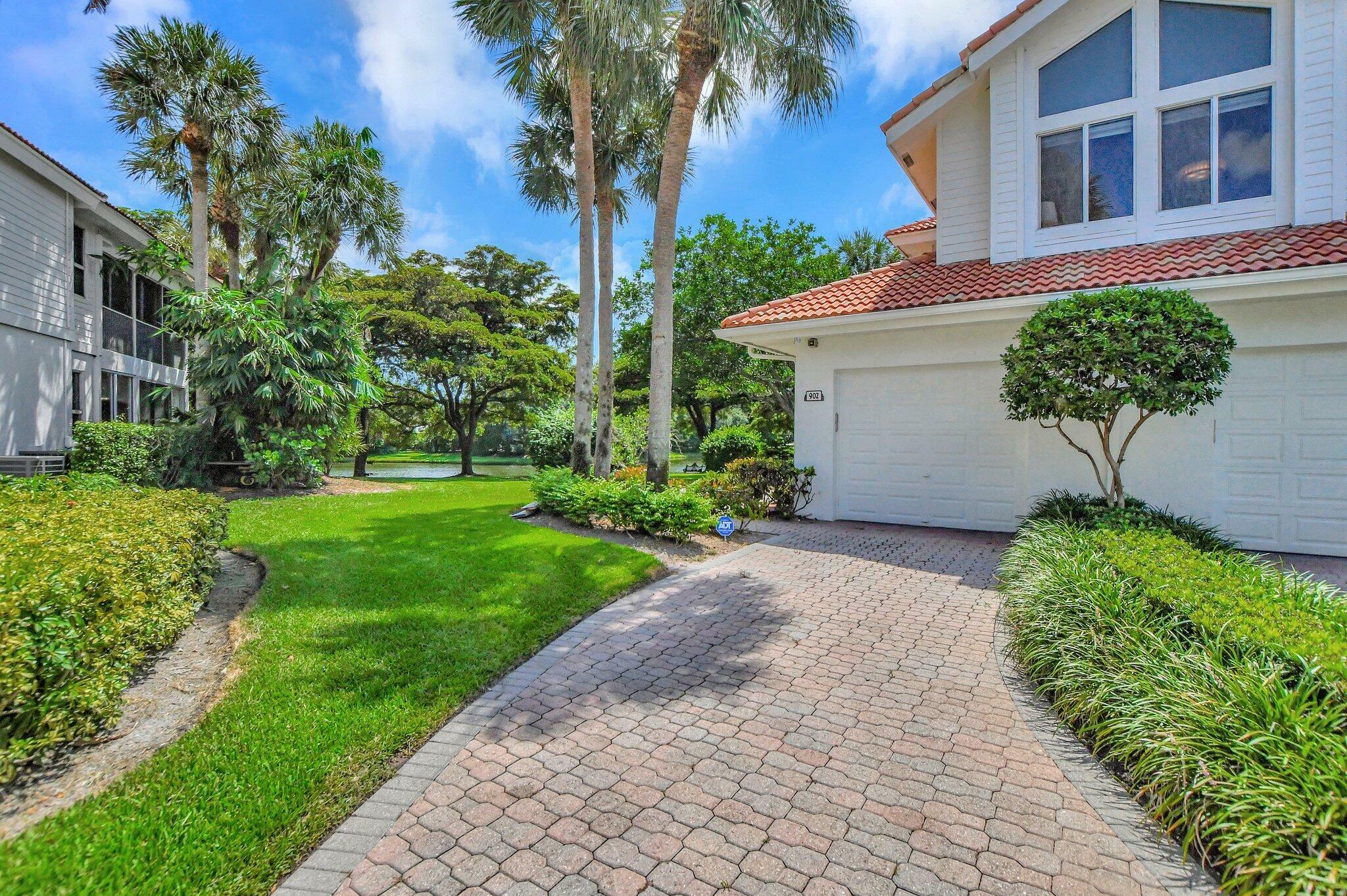 Property Photo:  2481 NW 59th Street NW 902  FL 33496 