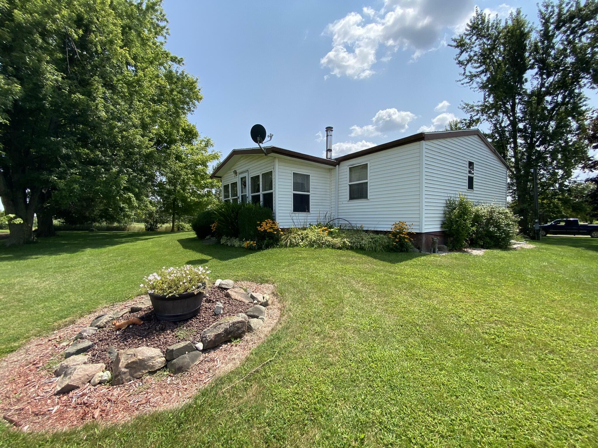 Property Photo:  4191 Tamarack Road  MI 49242 