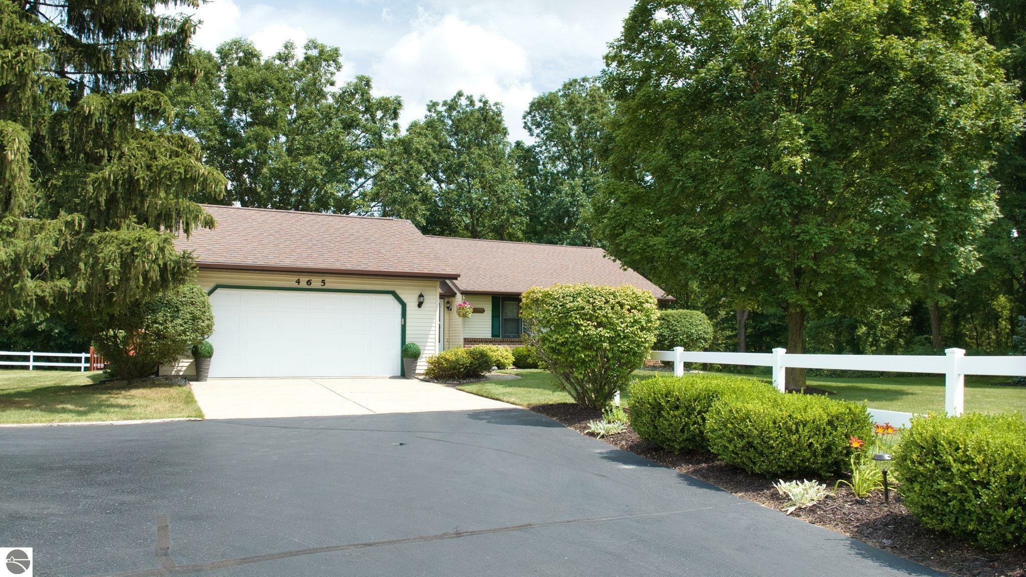 Property Photo:  465 Bluegrass Road  MI 48858 