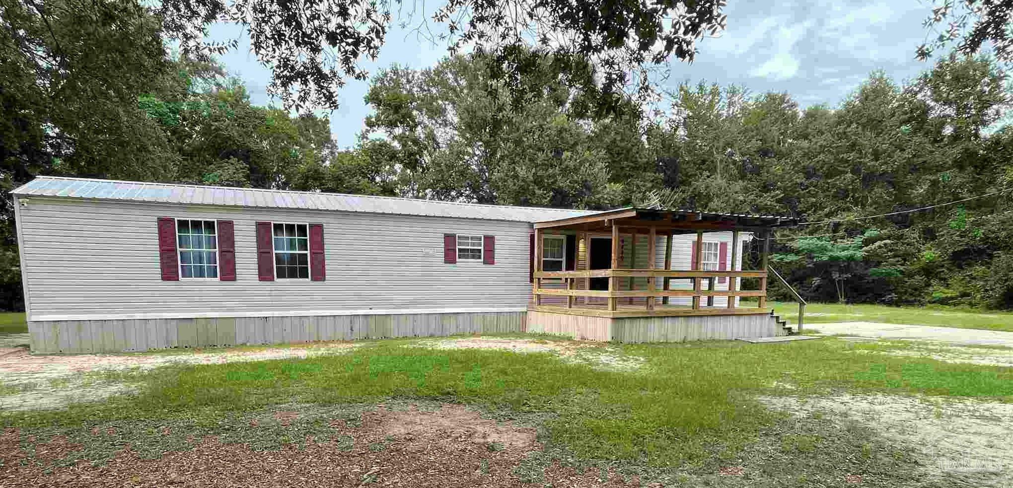 Property Photo:  6480 Robie Rd  FL 32570 