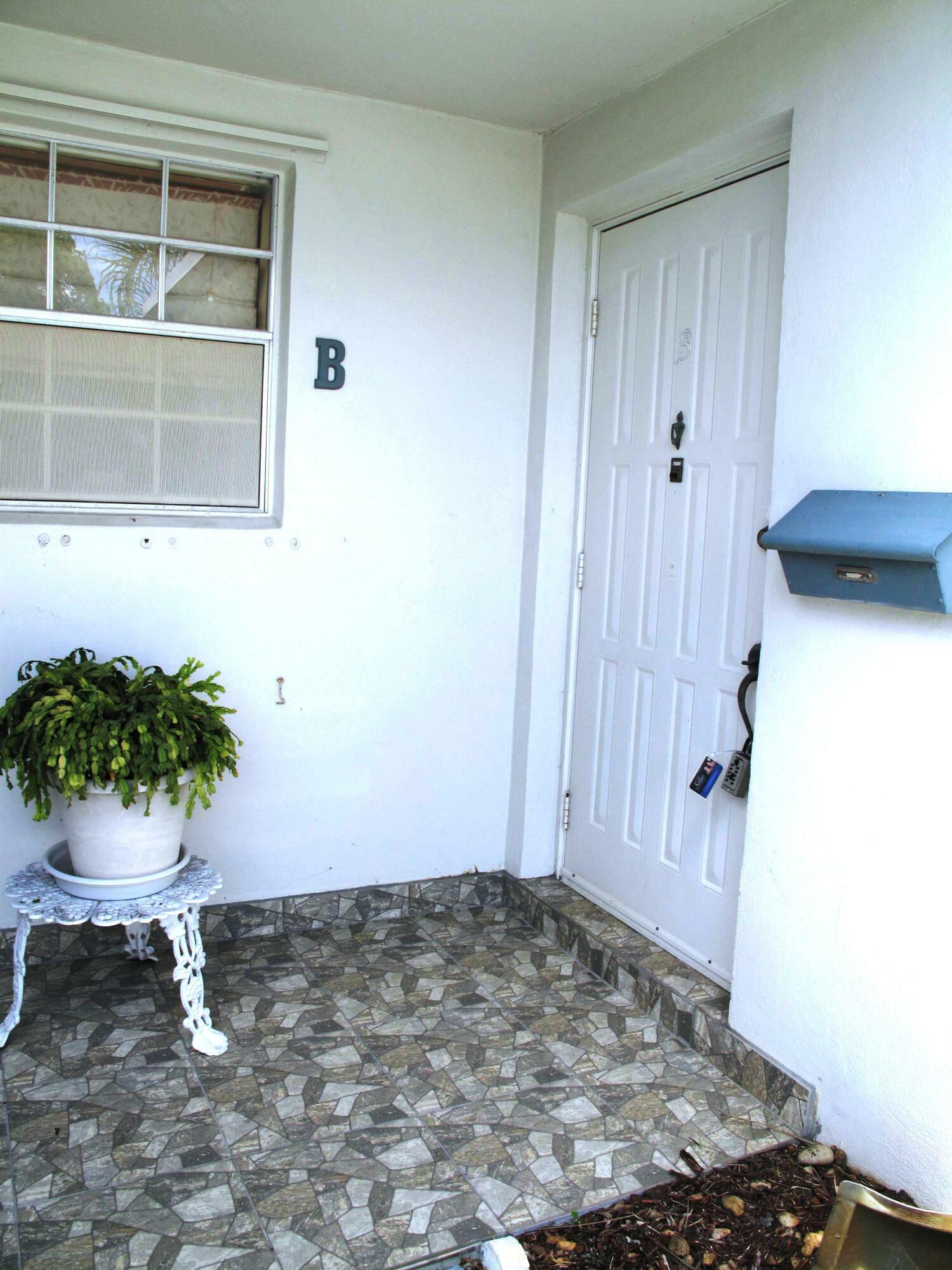 Property Photo:  1202 S Drive Circle B  FL 33445 