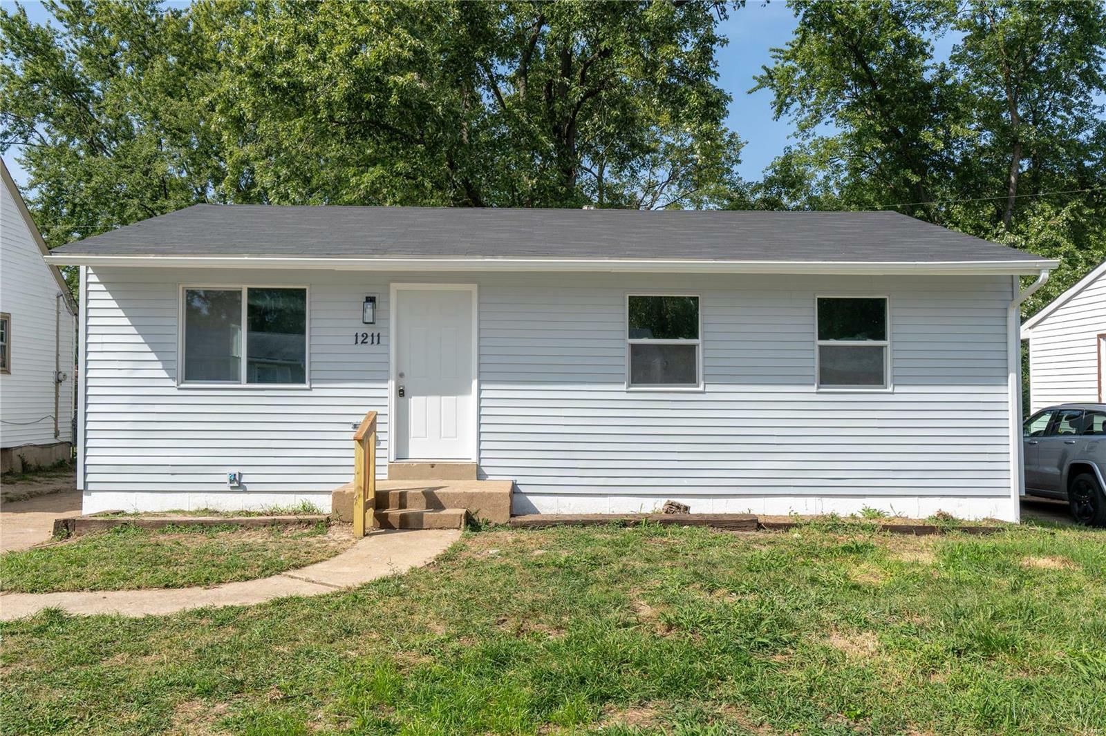 Property Photo:  1211 Walker Avenue  MO 63138 