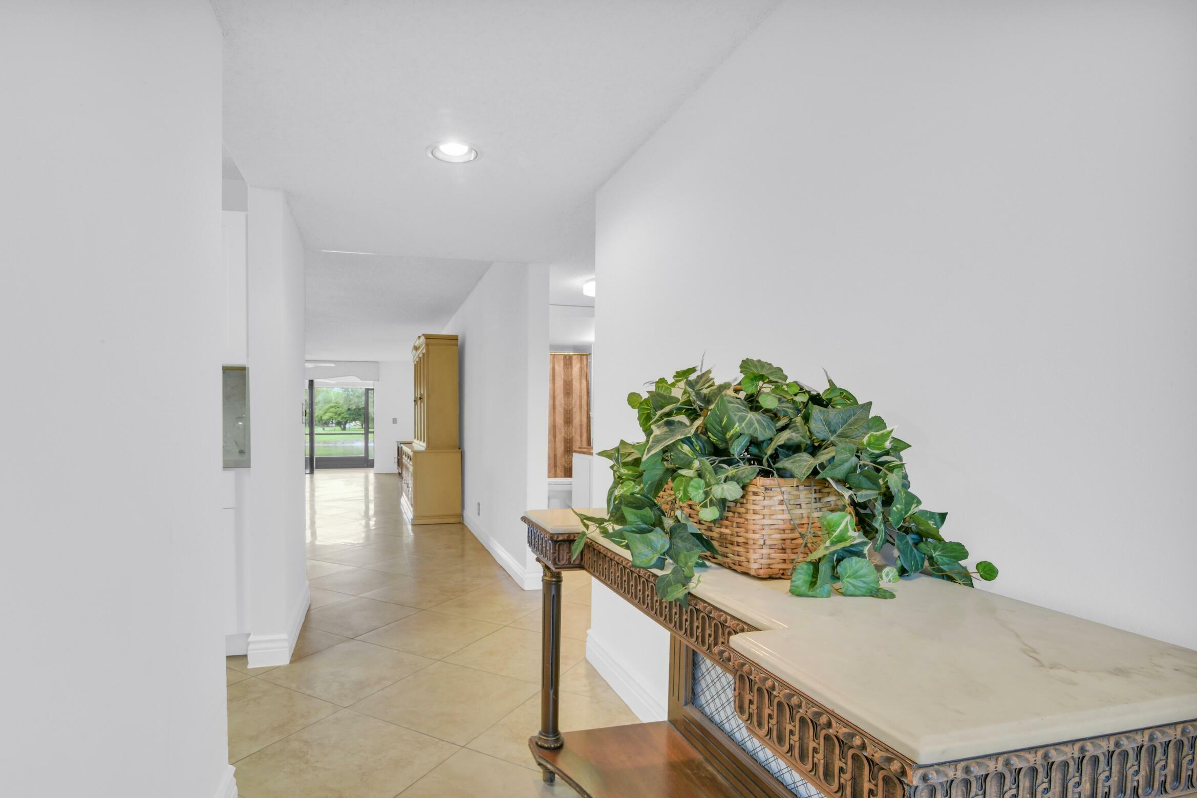 Property Photo:  5550 Witney Drive 103  FL 33484 