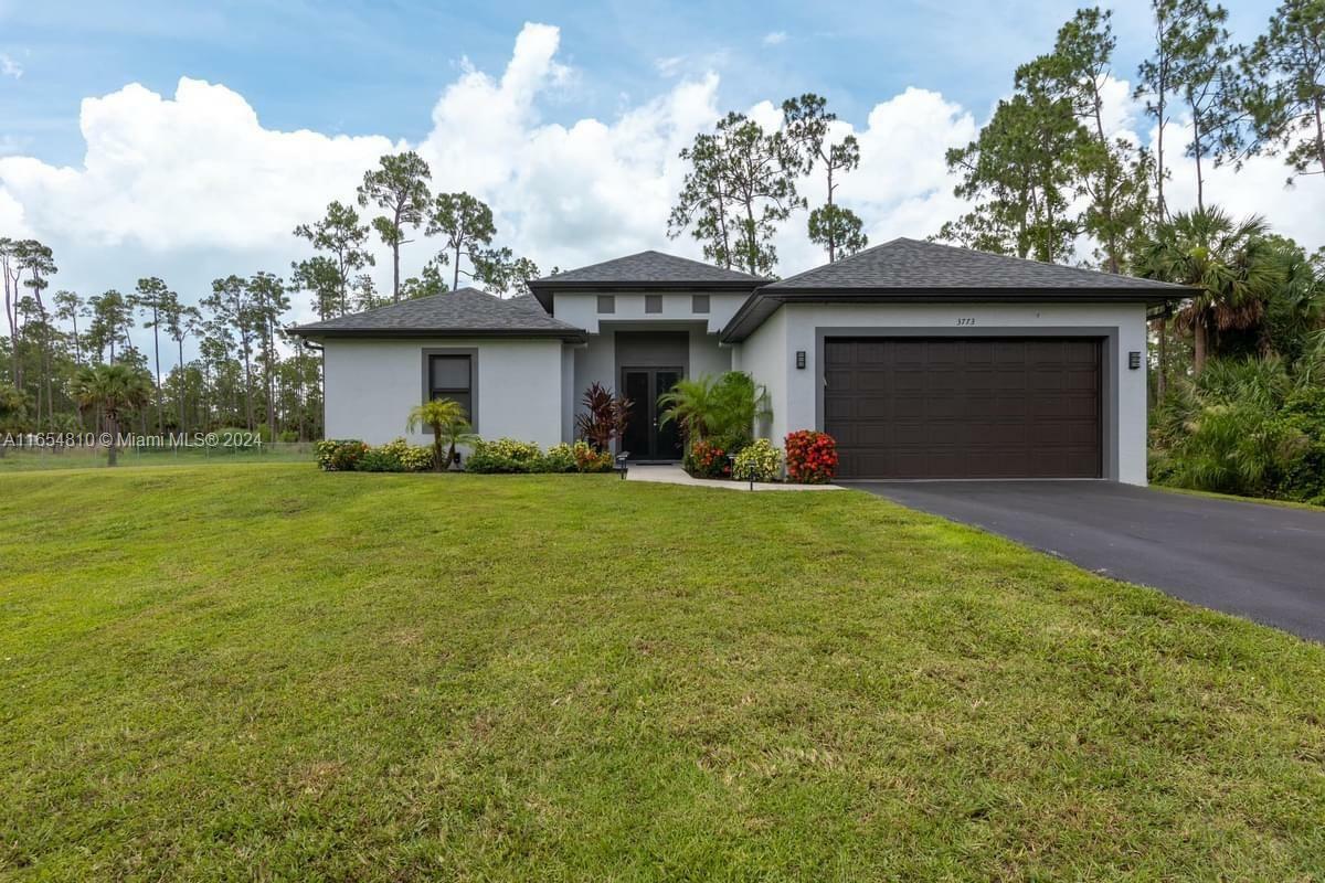 Property Photo:  3773 8th Ave NE, Golden Gate Estates, Naples  FL 34120 