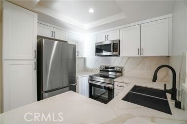 Property Photo:  22100 Burbank Boulevard 233D  CA 91367 