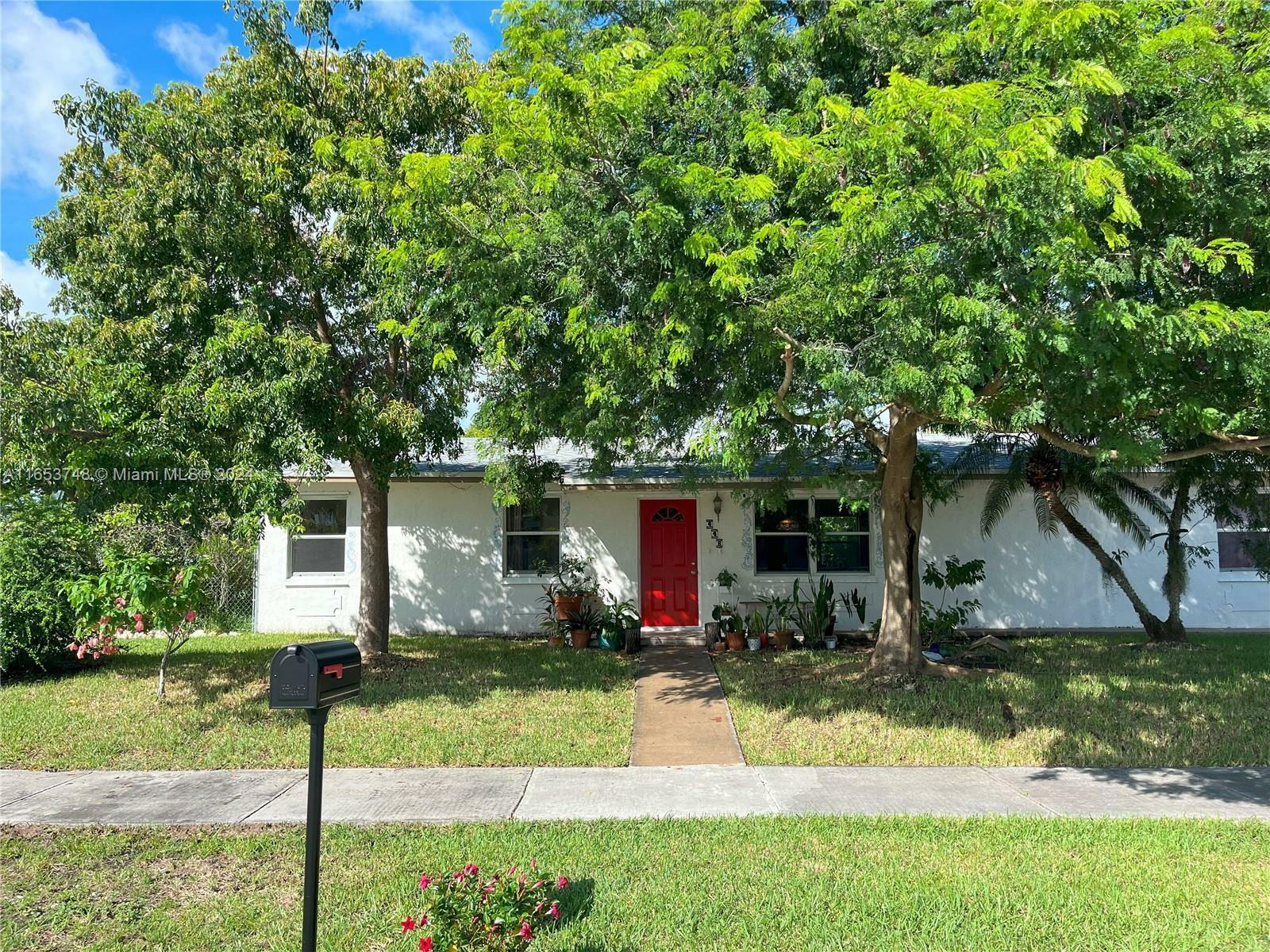 Property Photo:  448 SW 17th Ter  FL 33030 