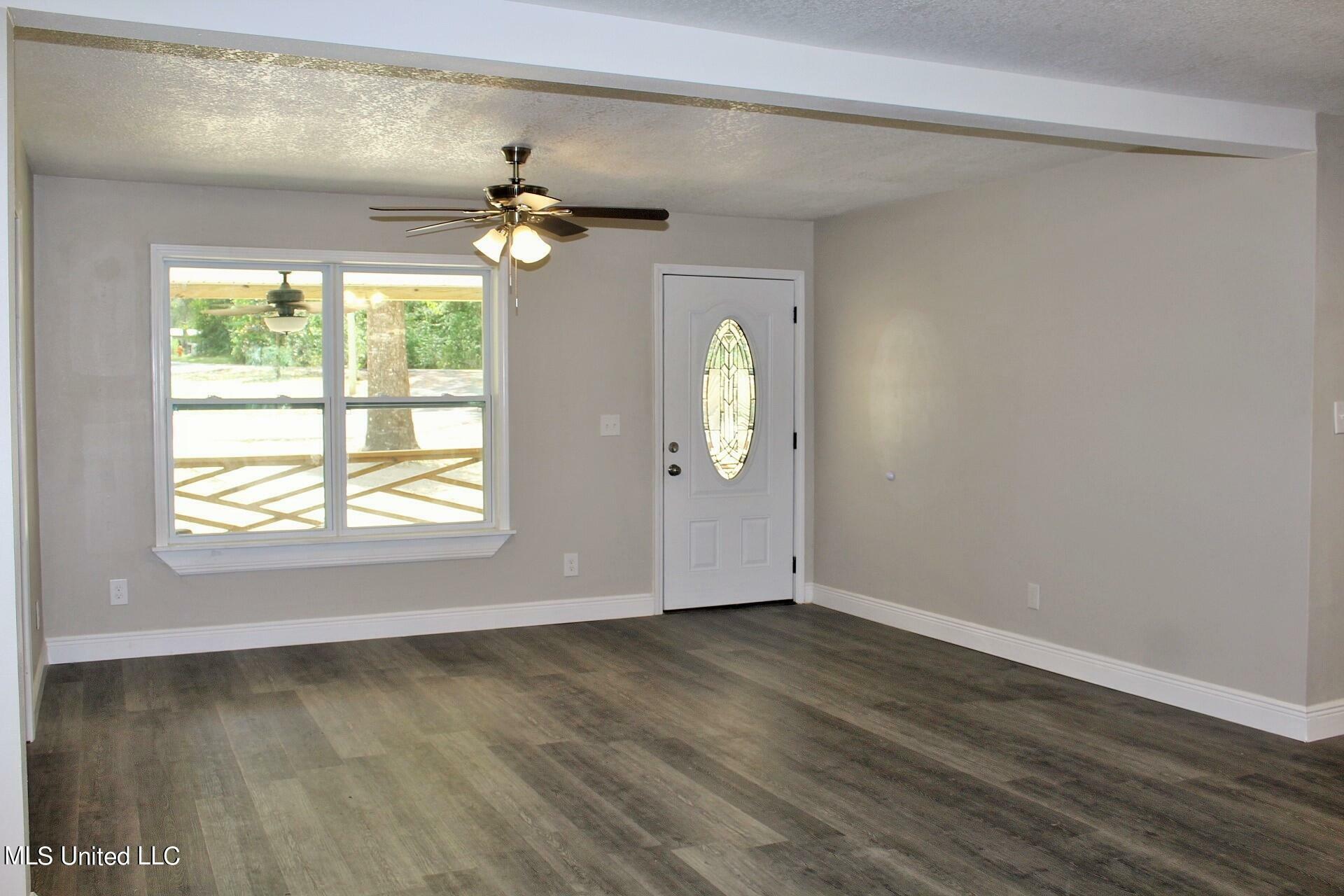 Property Photo:  122 J W Holland  MS 39452 