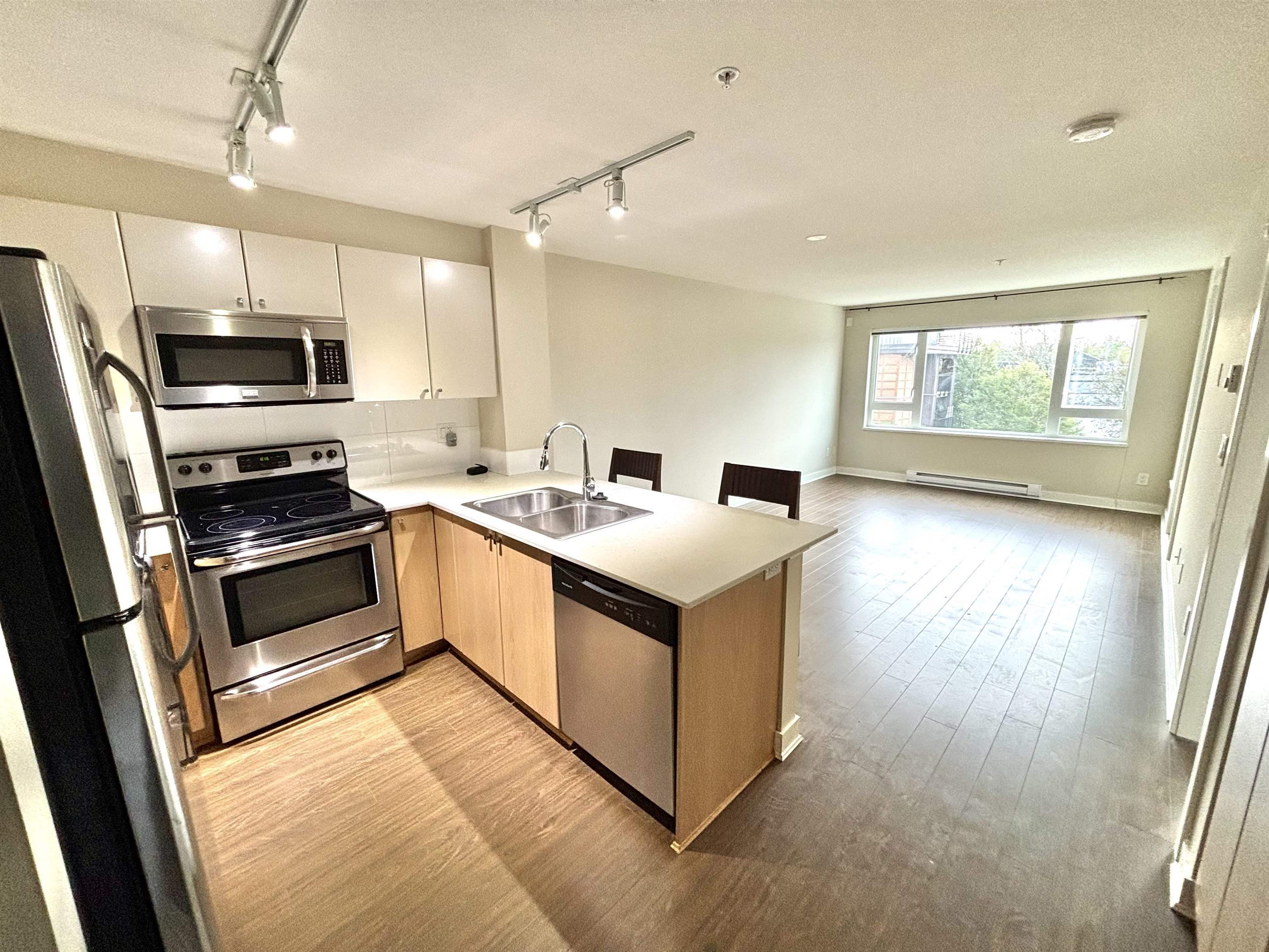 Property Photo:  13740 75A Avenue 304  BC V3W 0E8 