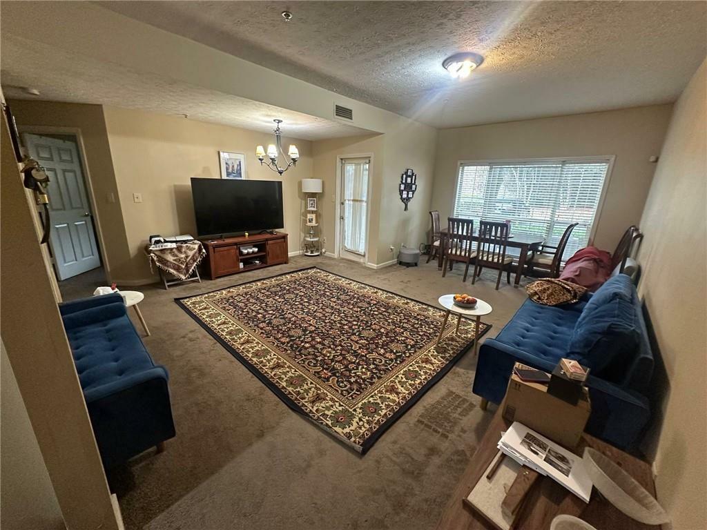 Property Photo:  1250 Parkwood Circle SE 1004  GA 30339 