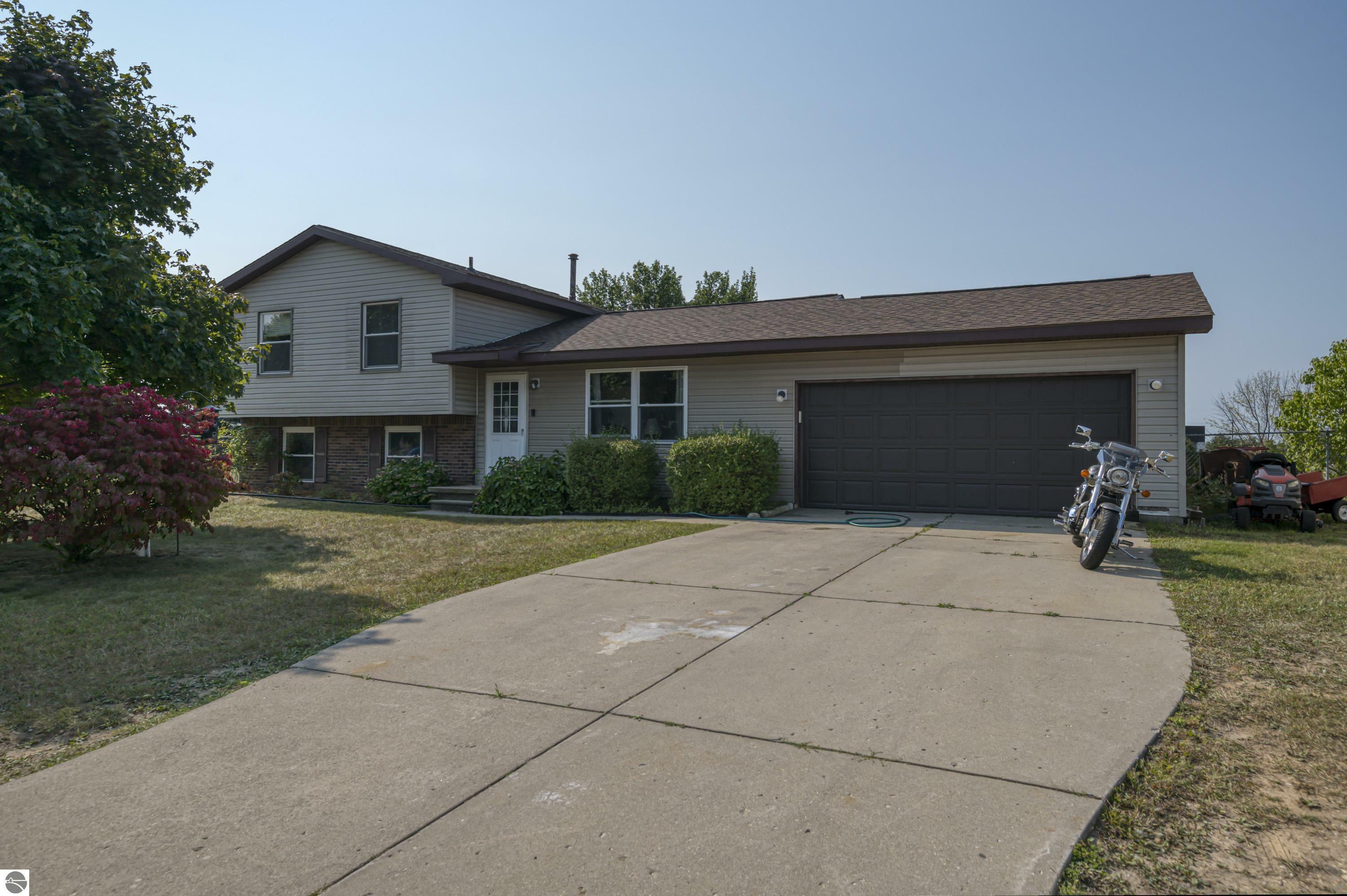 Property Photo:  3925 Apollo Drive  MI 49686 