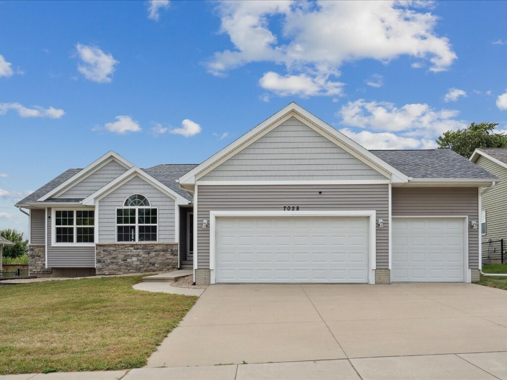 Property Photo:  7028 Rolling Ridge Drive SW  IA 52404 