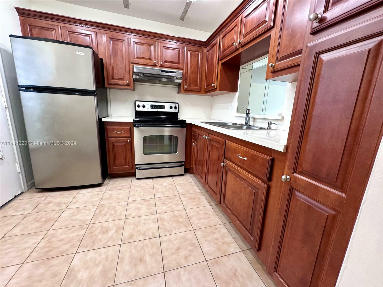 Property Photo:  319 NE 14th Ave 406  FL 33009 