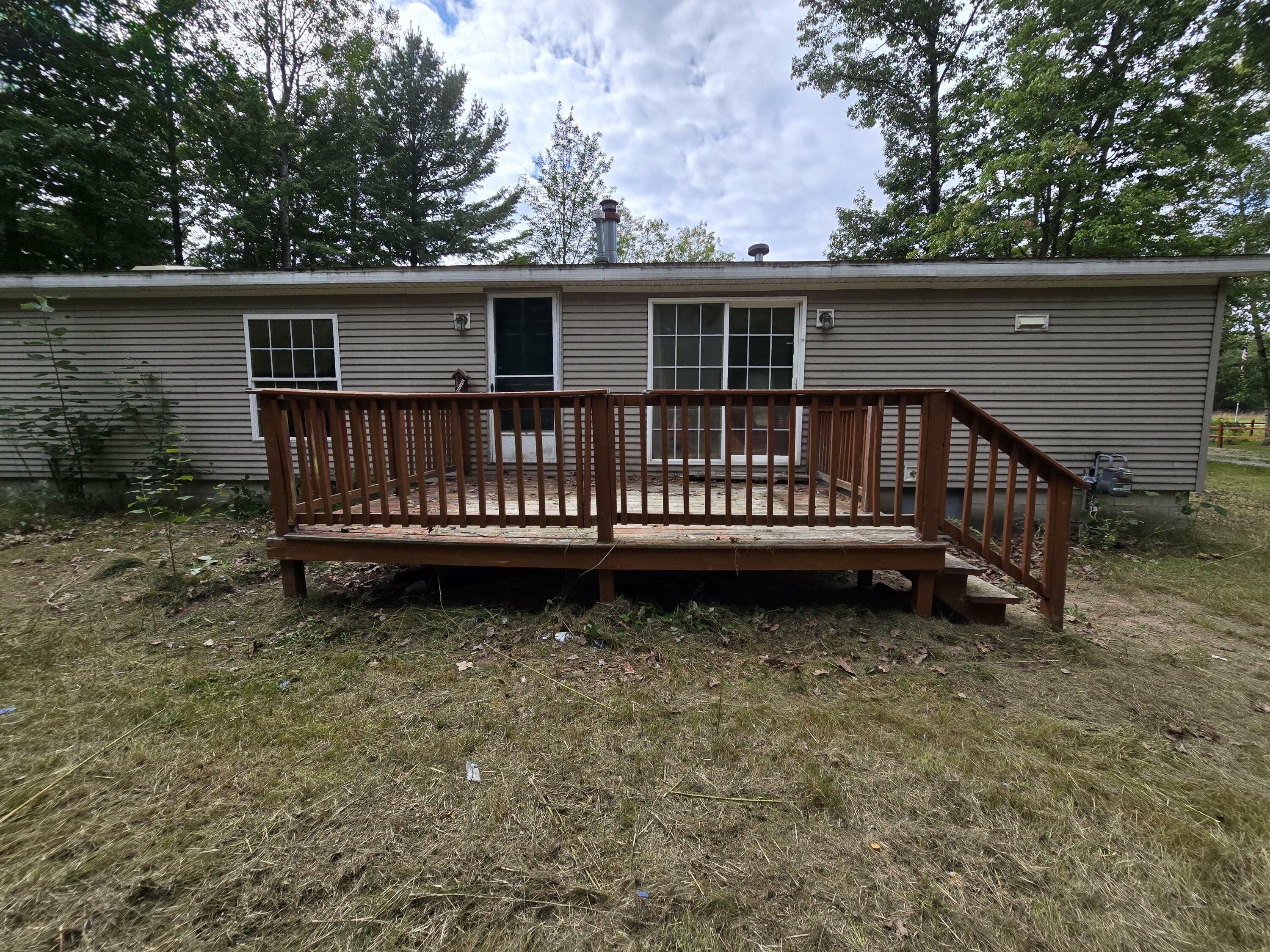 Property Photo:  9113 S Old 27 South  MI 49735 