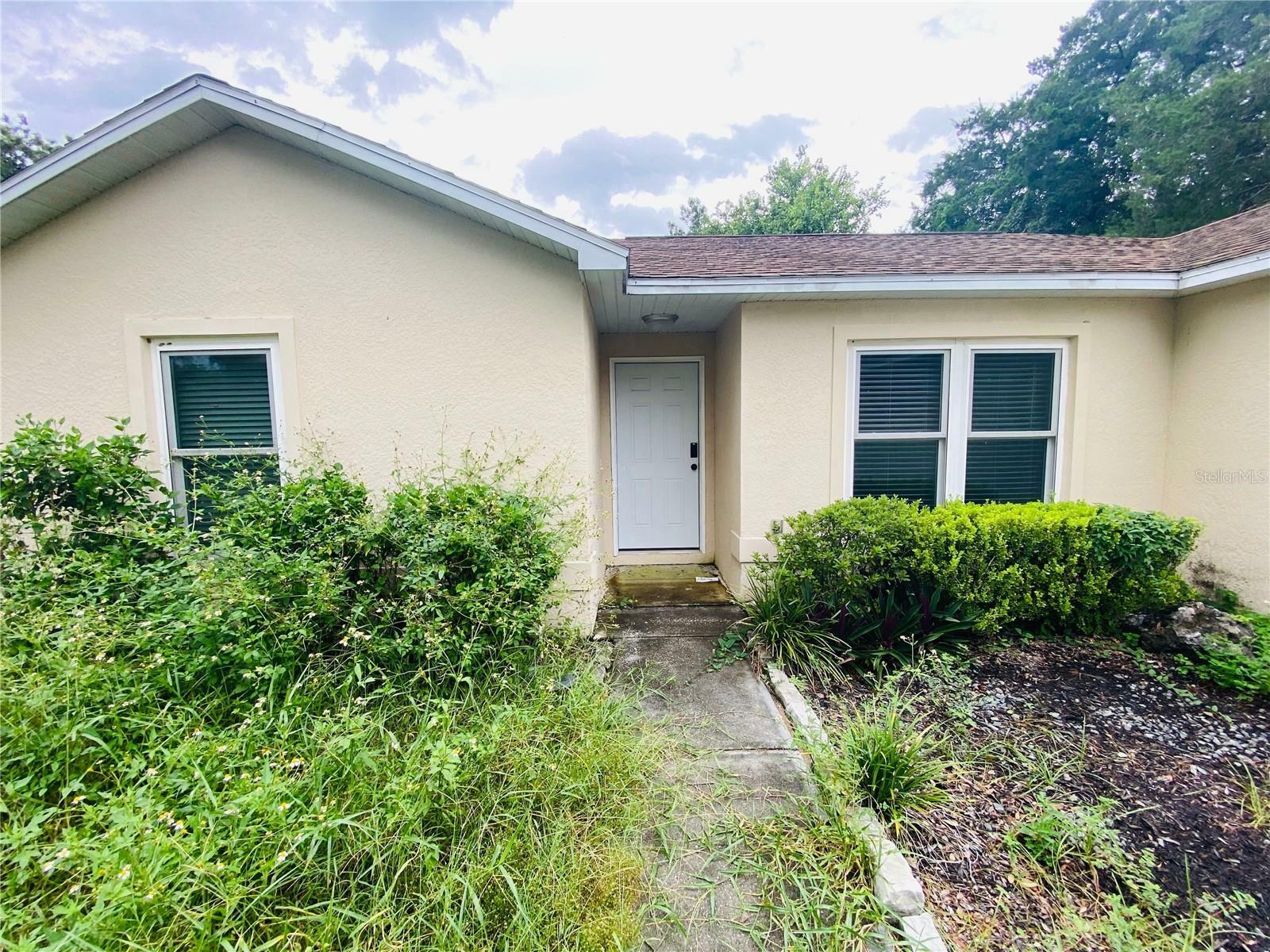 Property Photo:  6311 Pinehurst Drive  FL 34606 