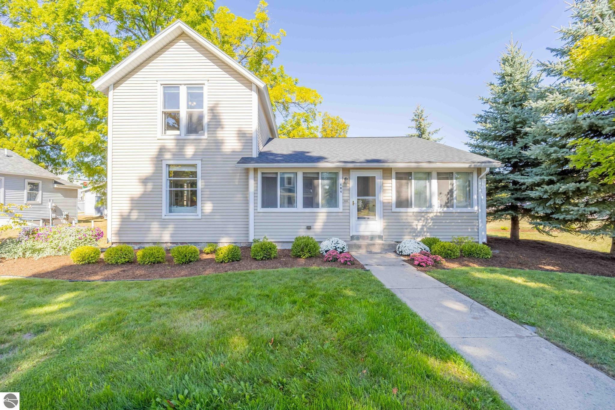 Property Photo:  104 Traverse Street  MI 49629 