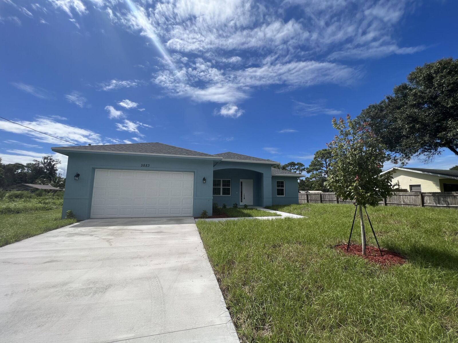 Property Photo: 5883 Pinetree Drive FL 34982